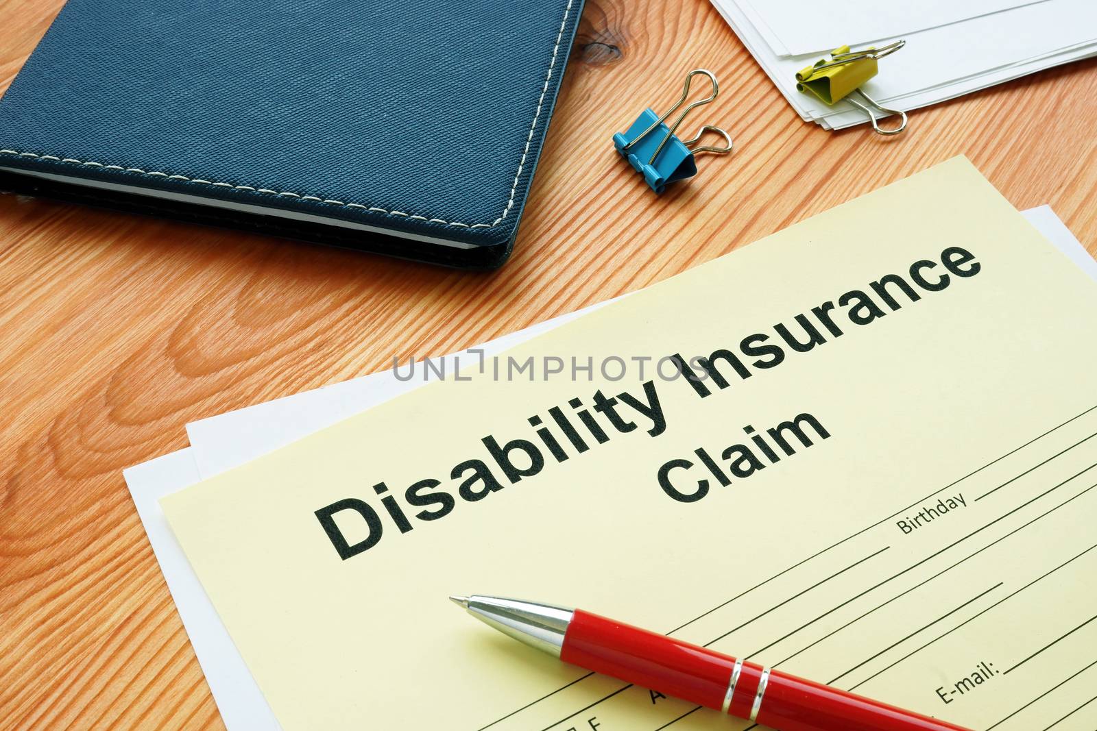 Disability Insurance Claim for filling in and pen.