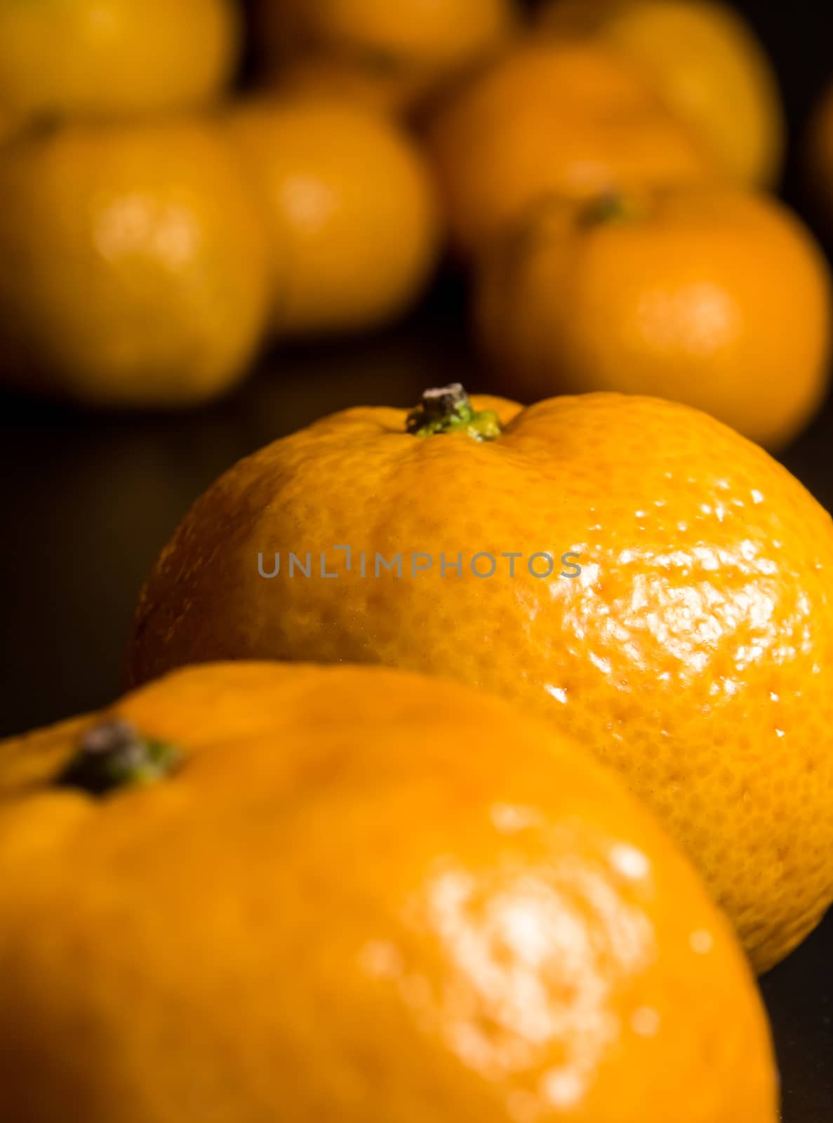 Glossy surface texture of freshness orange fruits by Satakorn