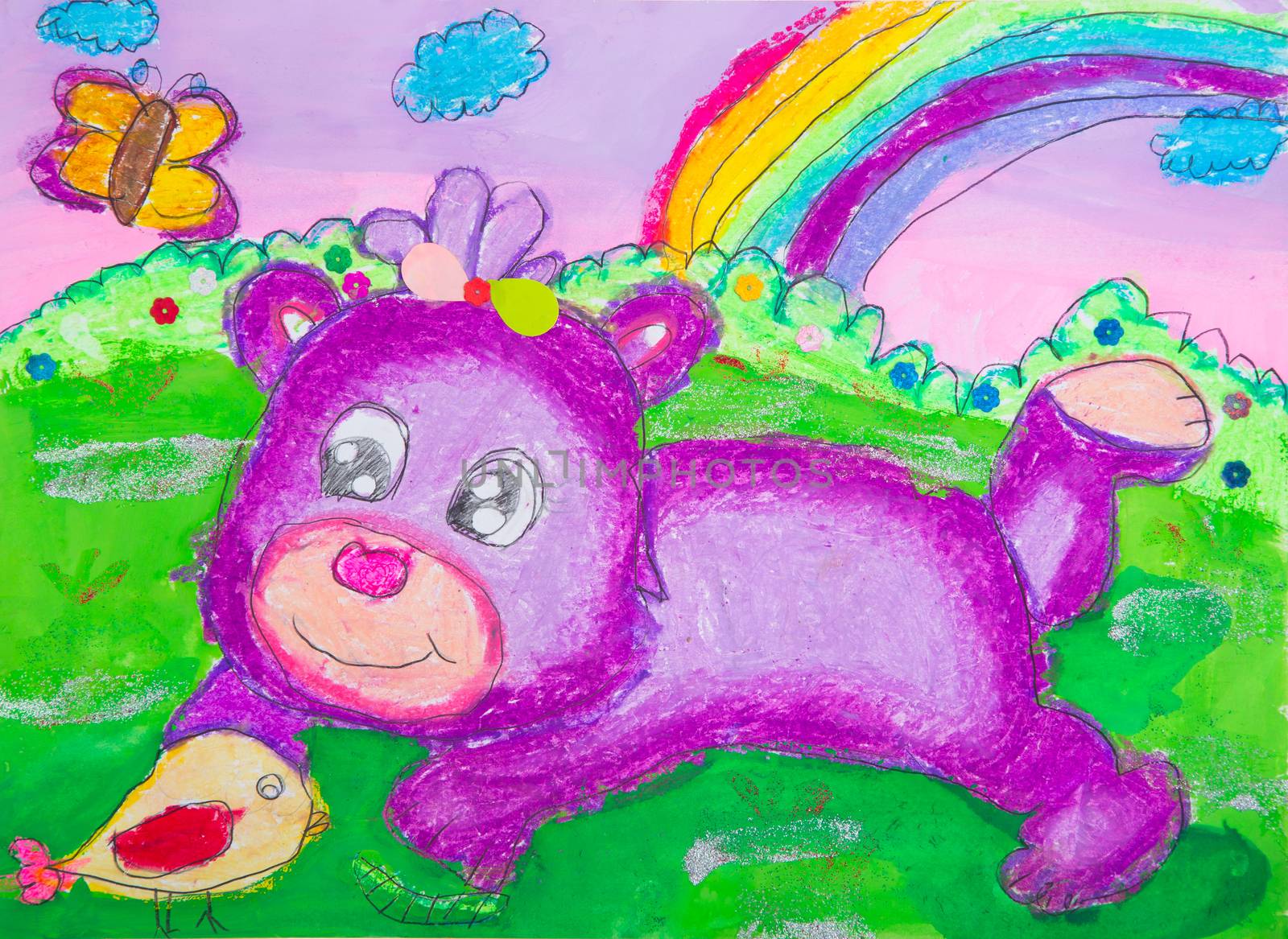 Child drawing using crayon and watercolor