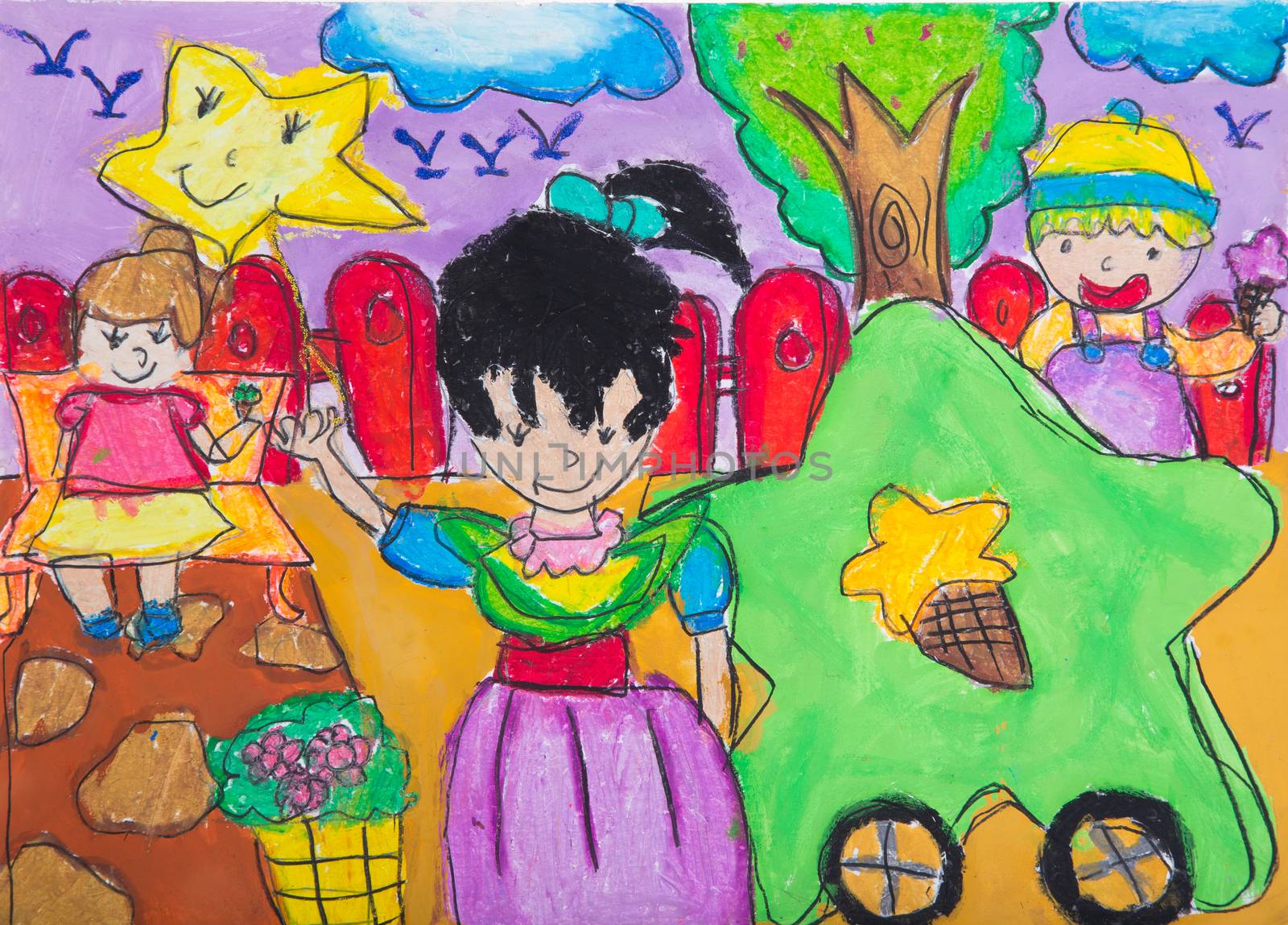 Child drawing using crayon and watercolor