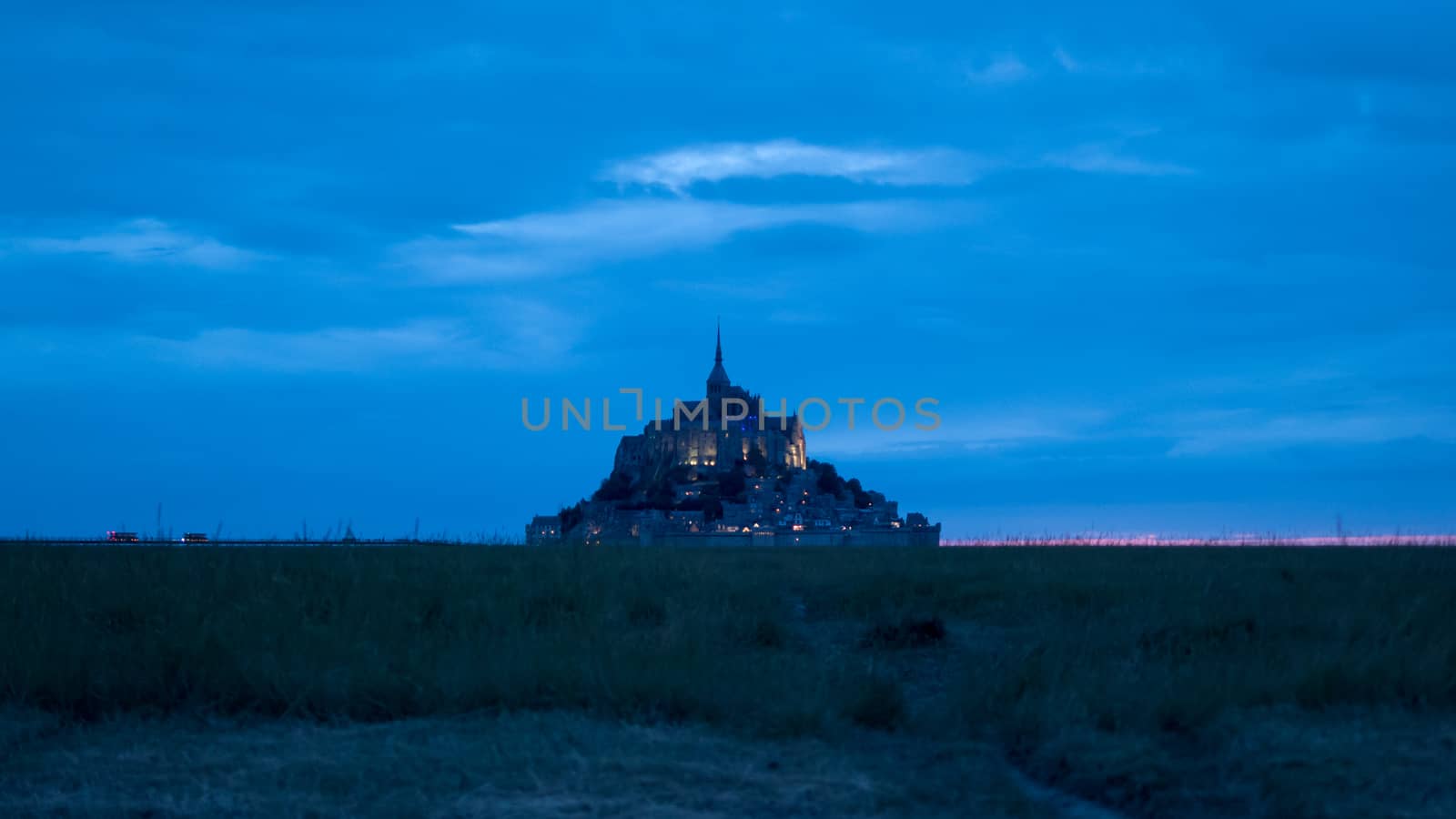 early night view from ground of Mont Saint michel peninsula, in the département of Manche, in Normandy, France 9-9-19