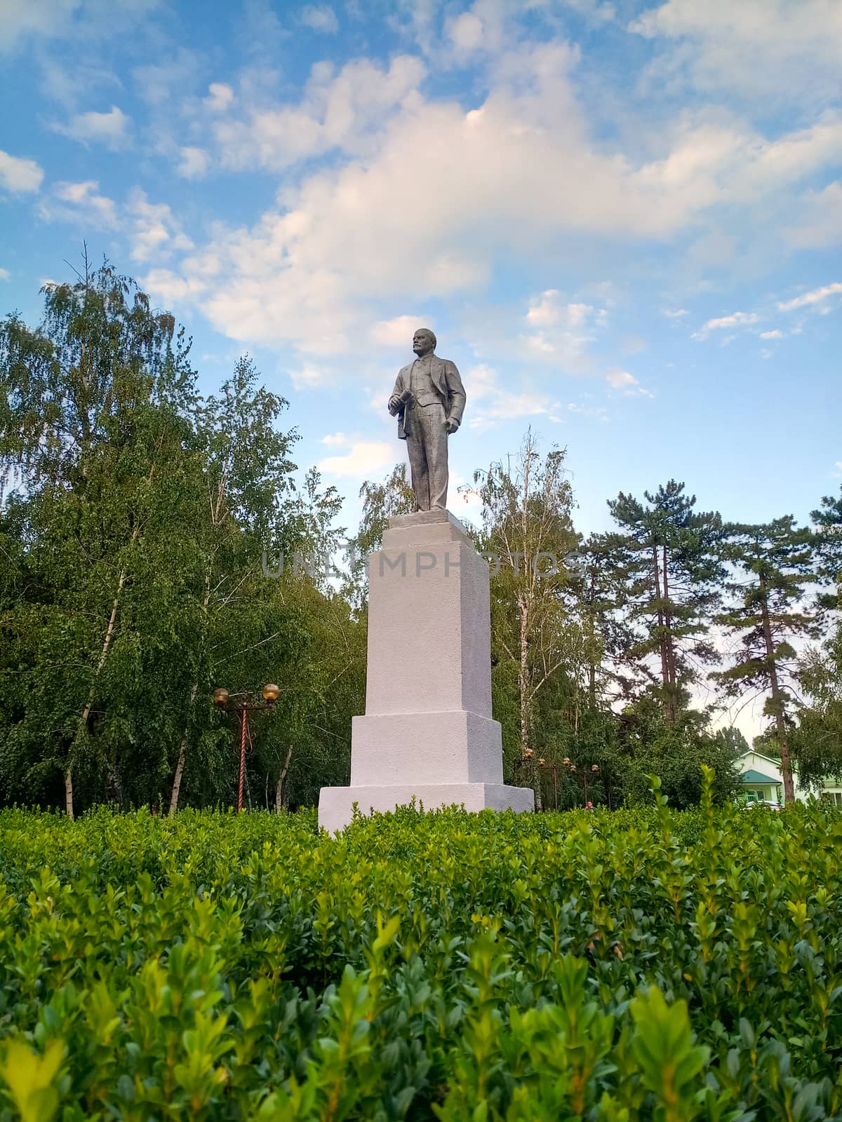 Monument to Lenin on a pedestal in the park. Leader of communism