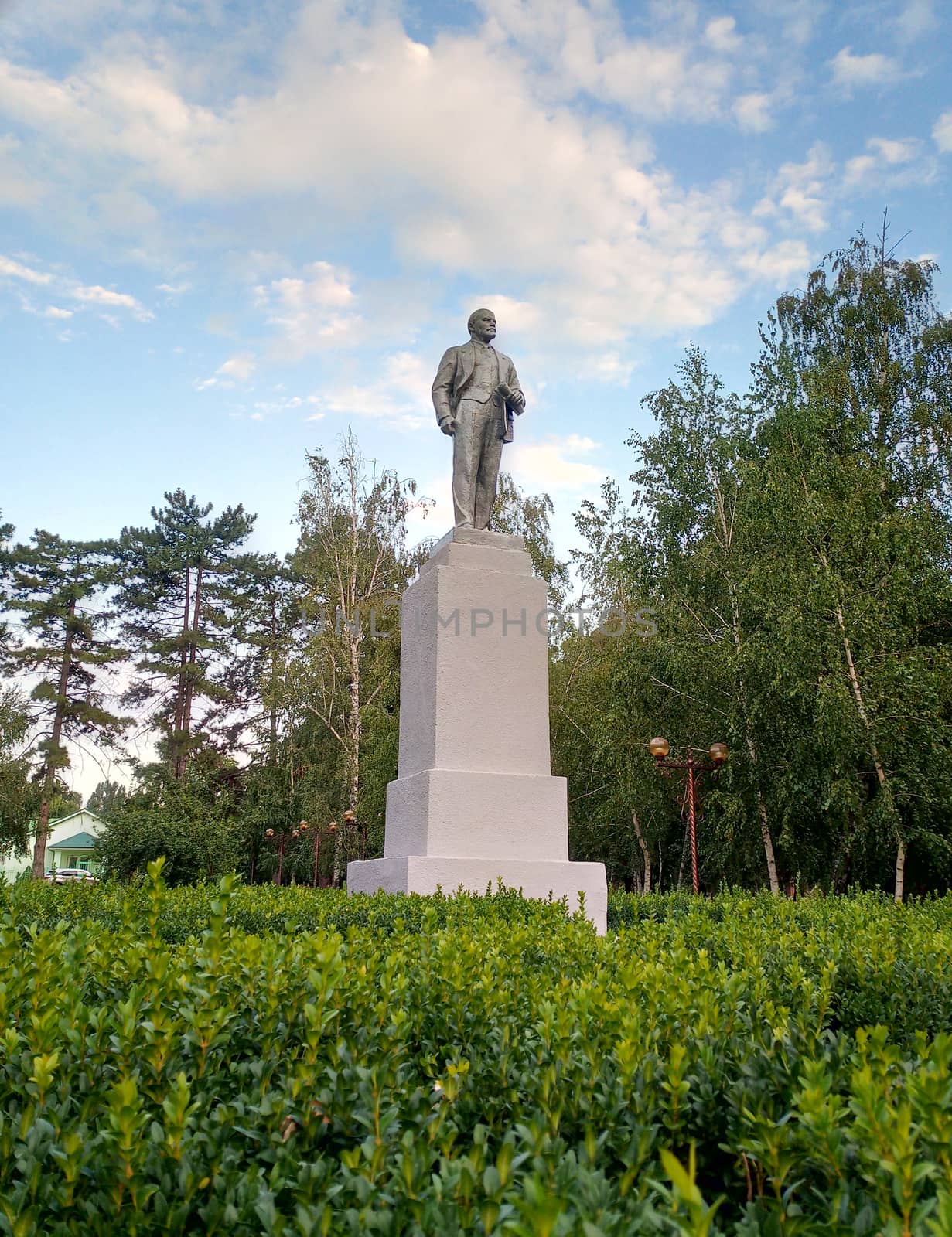Monument to Lenin on a pedestal in the park. Leader of communism