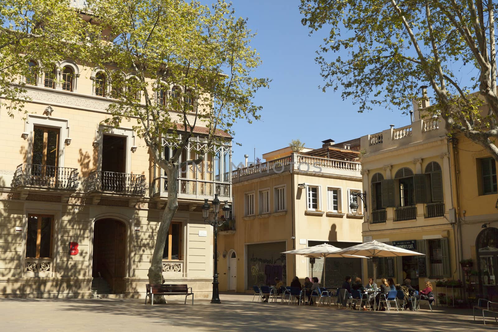 Barcelona, Spain - 9 April 2015: People enjoying summer terrace at Placa de la Concordia