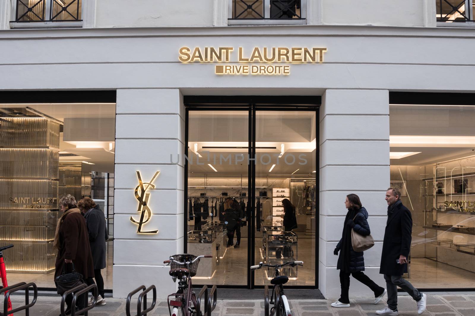 Yves Saint Laurent Store facade, also know as YSL in Paris, France Luxury brand shop on " Rue saint Honoré " by ontheroadagain