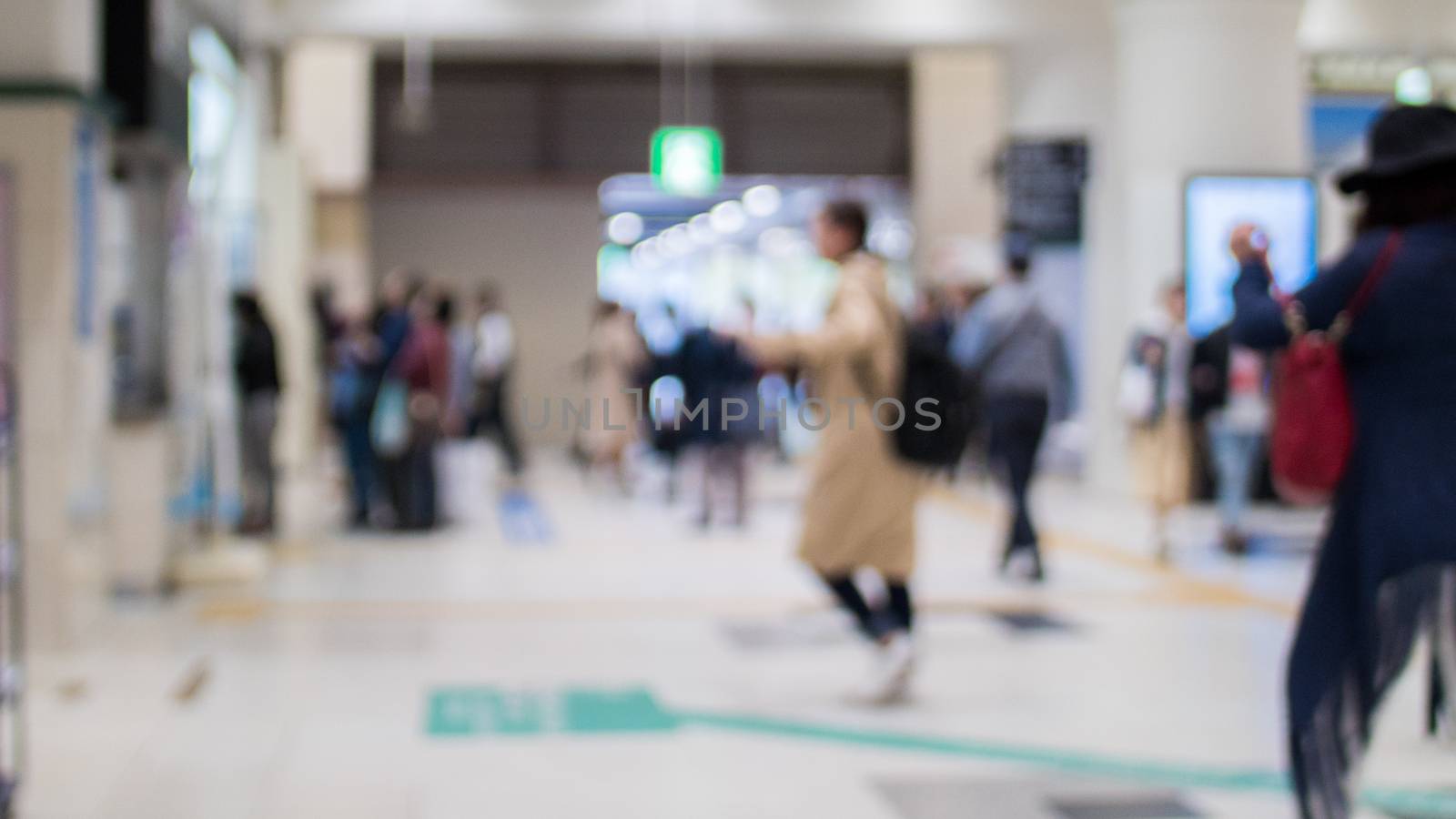 Blurred picture of Japanese people in subway station by ontheroadagain