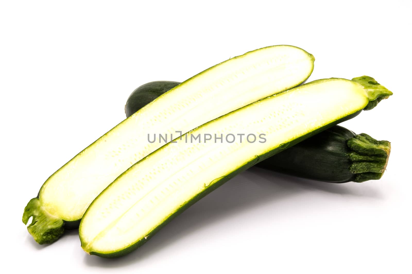 Close up on a fresh zucchini and cut  by Philou1000