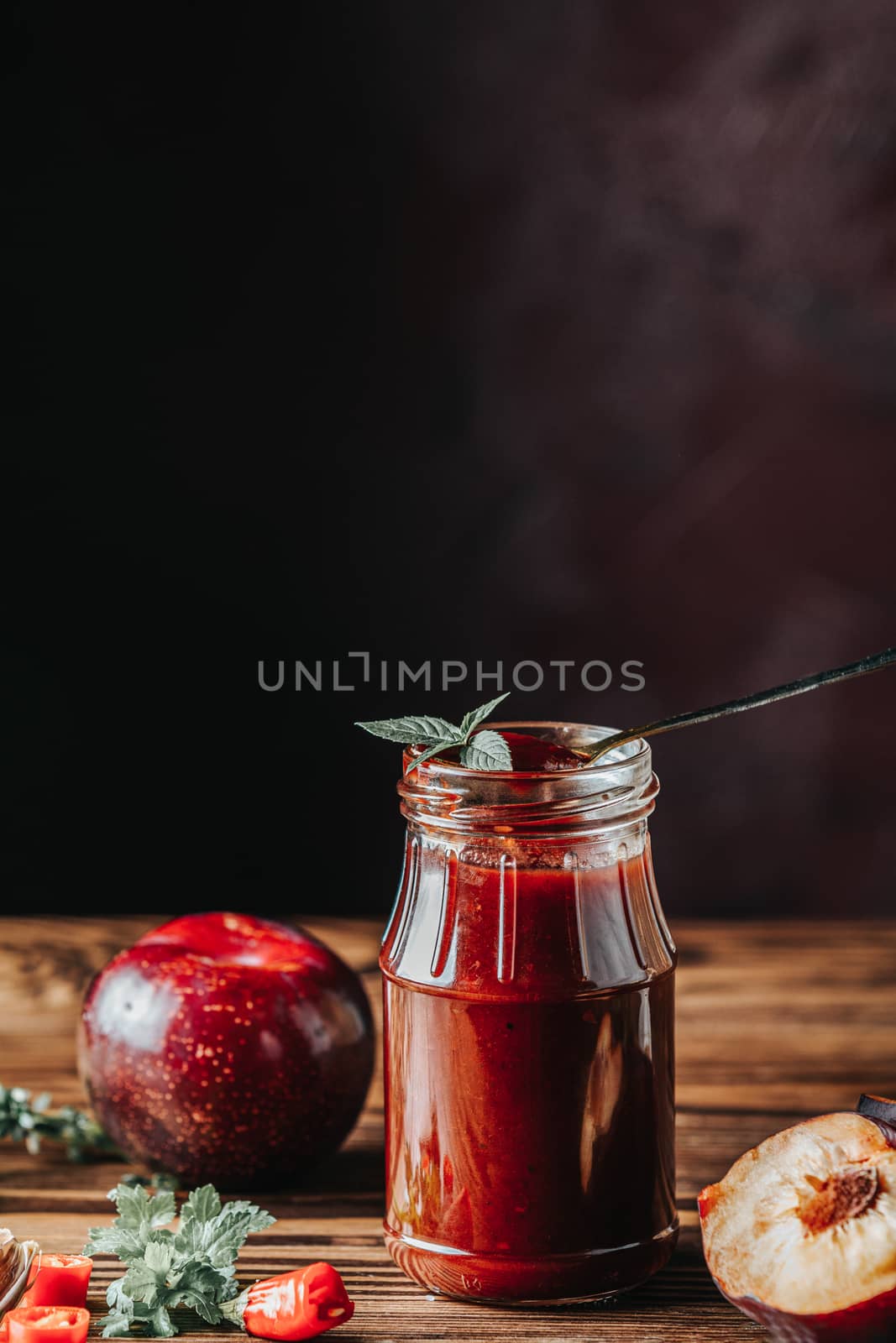 Homemade DIY natural canned hot plum sauce chutney with chilli o by ArtSvitlyna