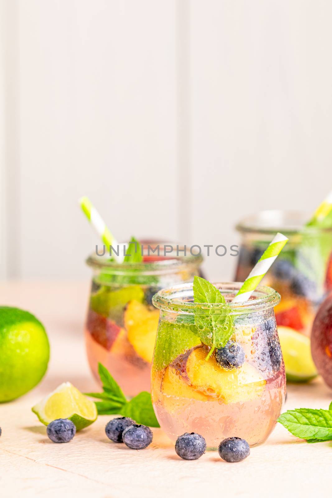 Blueberry and peach infused water, cocktail, lemonade or tea in  by ArtSvitlyna