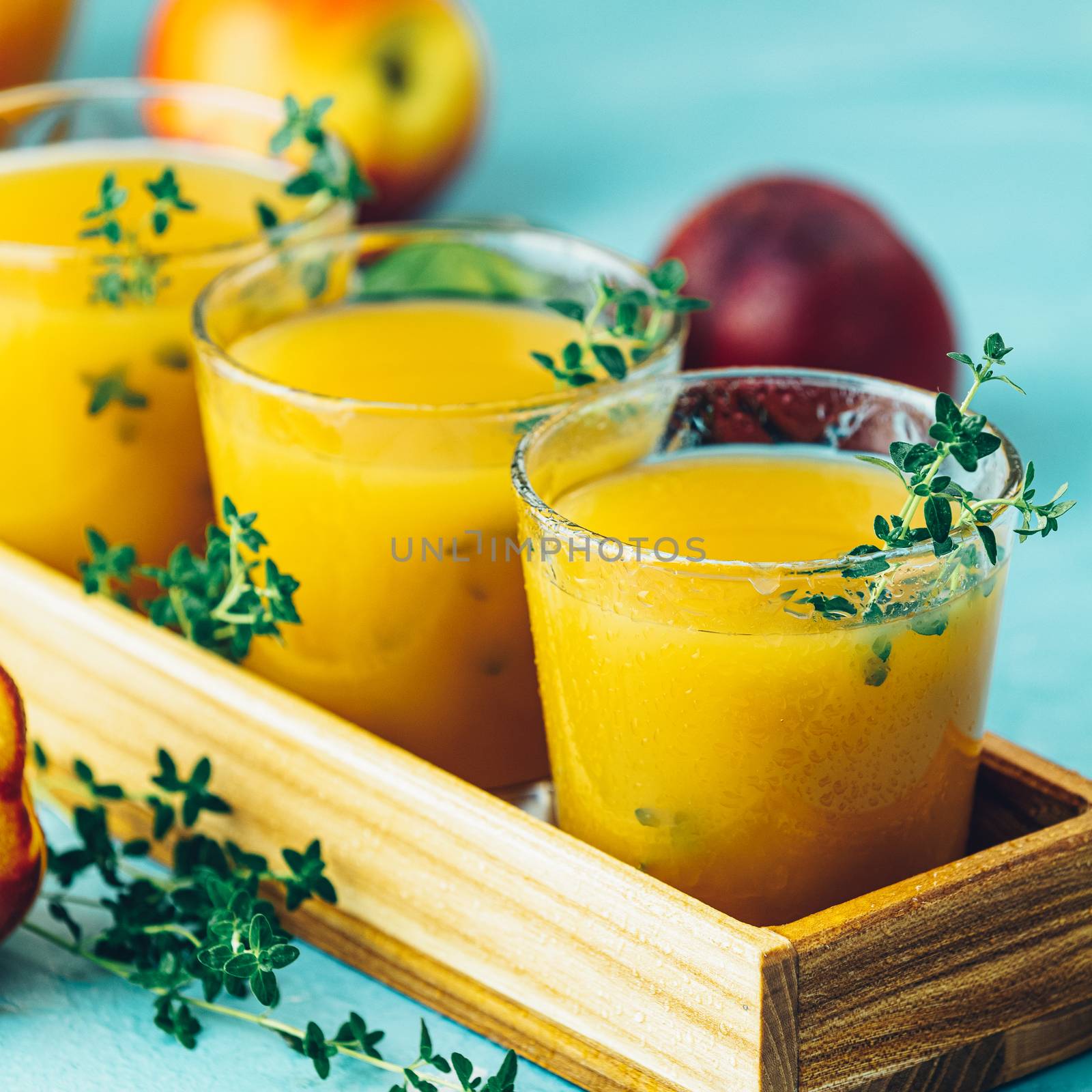 Glass of fresh healthy peach smoothie or juice by ArtSvitlyna