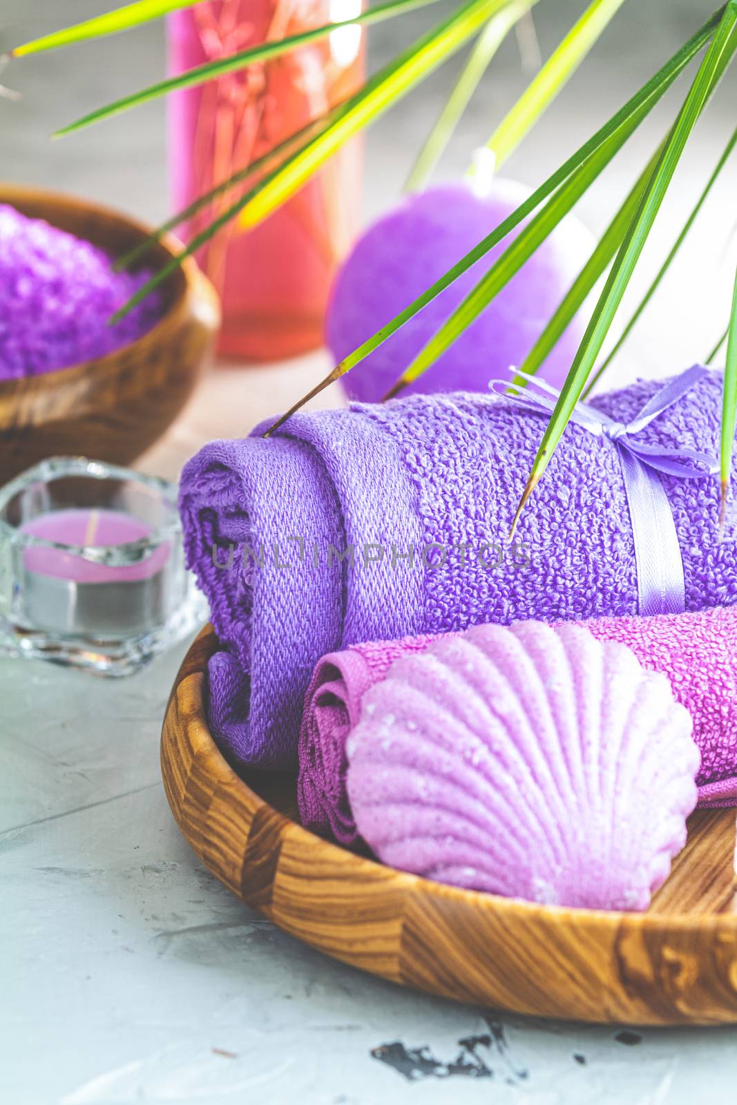 Spa composition with violet color, space for text. Natural cosmetics and wellness concept.