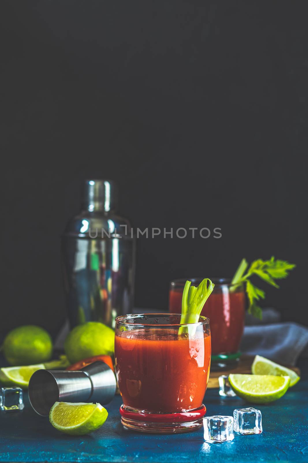 Bloody Mary cocktail in portion drink glasses by ArtSvitlyna