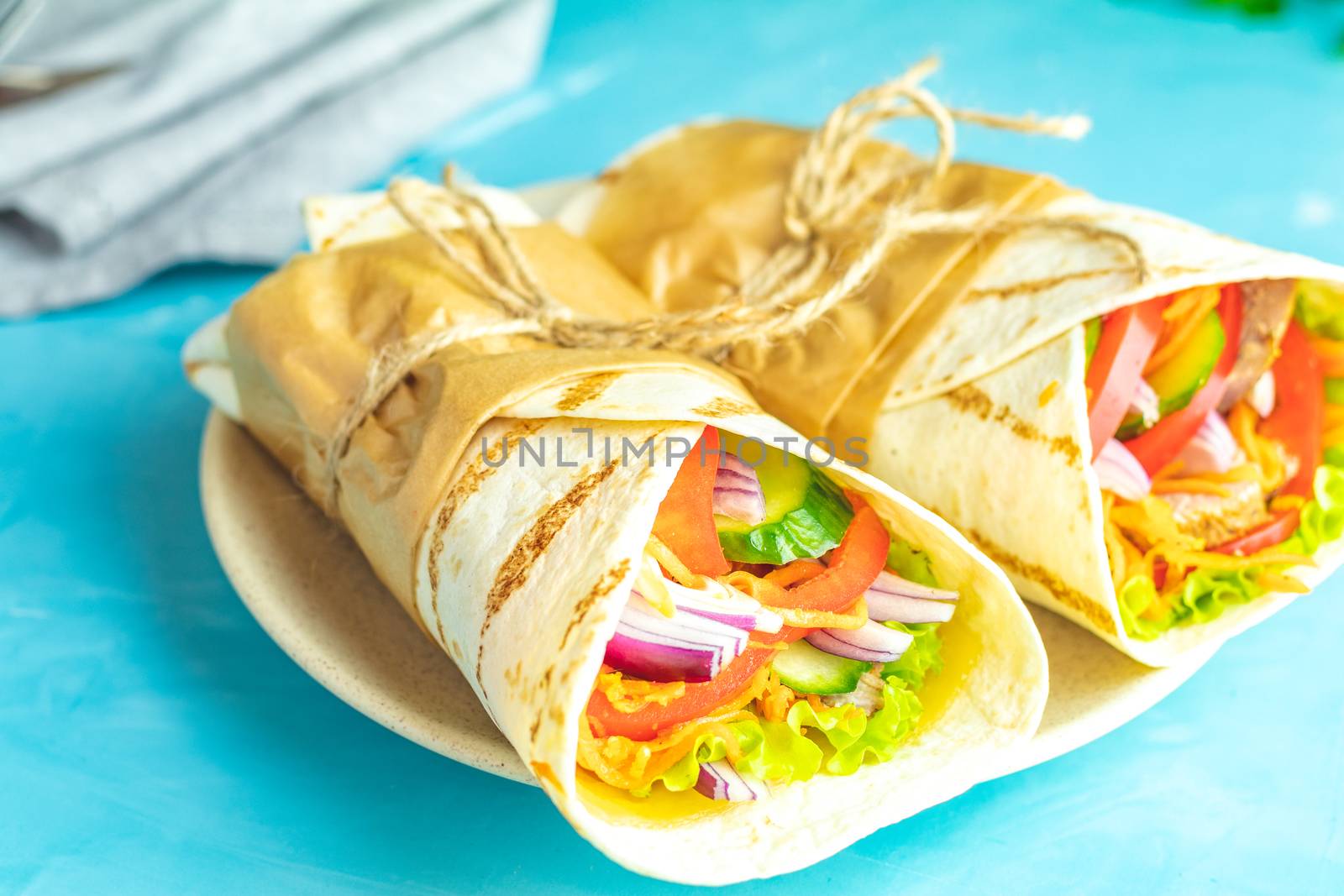 Shawarma sandwich gyro fresh roll of lavash (pita bread) chicken beef shawarma falafel RecipeTin Eats Filled with grilled meat, vegetables, cheese. Traditional Middle Eastern snack.