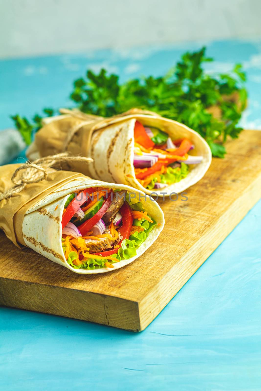 Shawarma sandwich gyro fresh roll of lavash (pita bread) chicken beef shawarma falafel RecipeTin Eats Filled with grilled meat, vegetables, cheese. Traditional Middle Eastern snack.