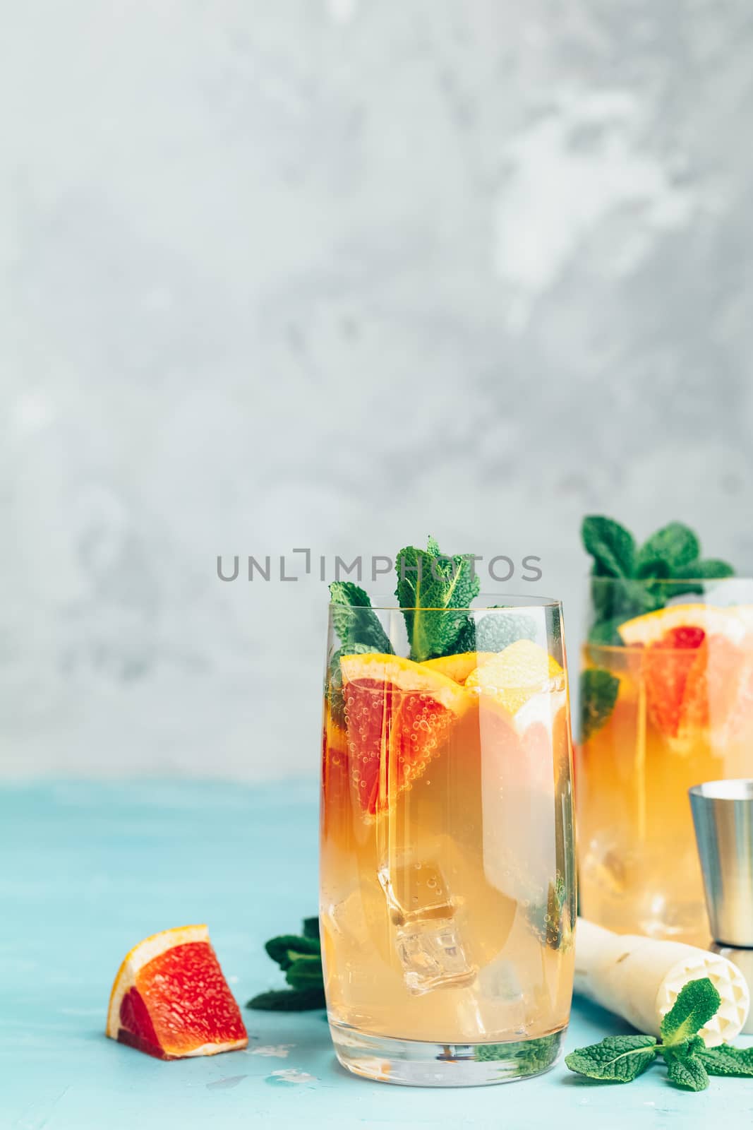 Grapefruit and fresh mint cocktail with juice by ArtSvitlyna