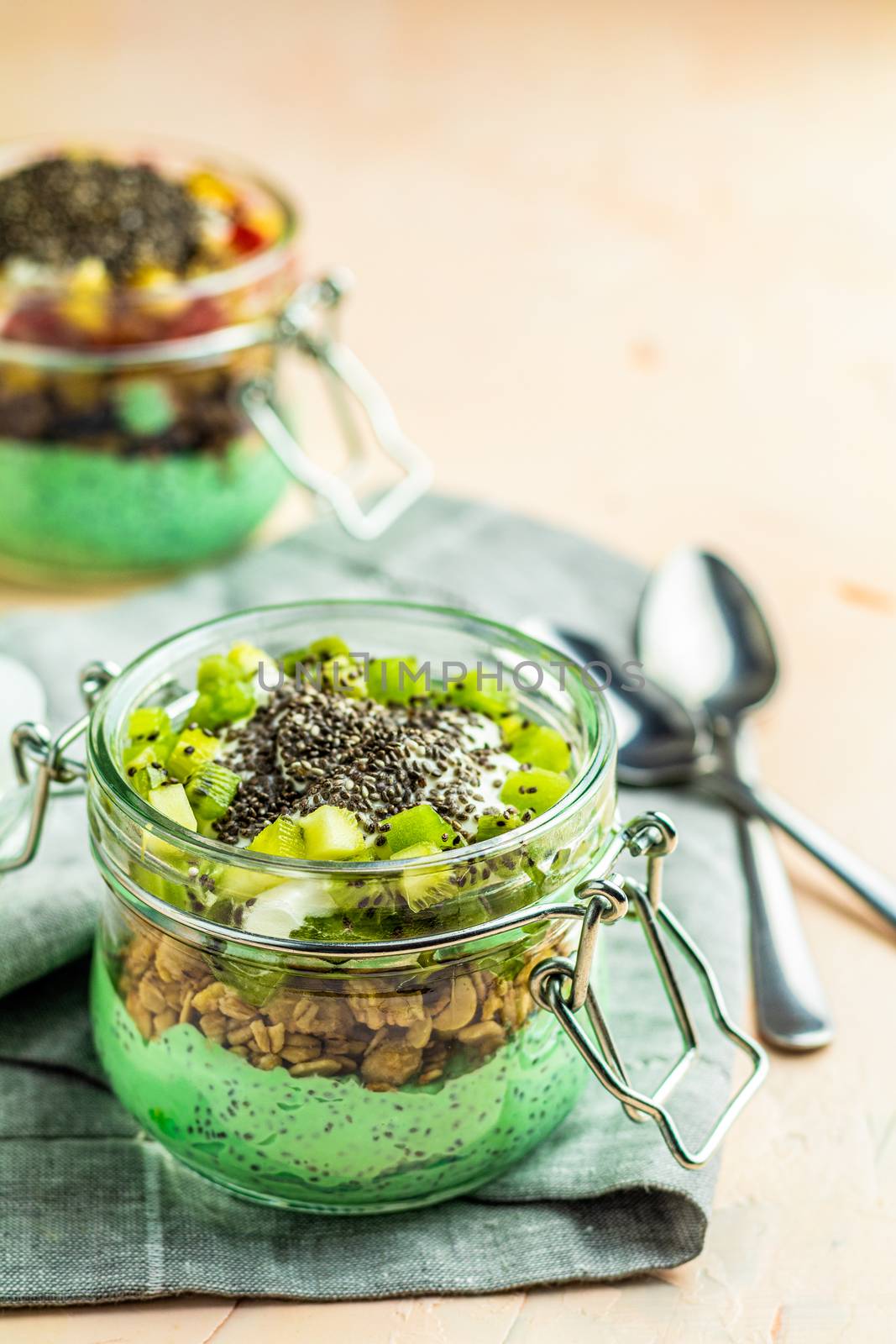 Two chia seed pudding with matcha green tea by ArtSvitlyna