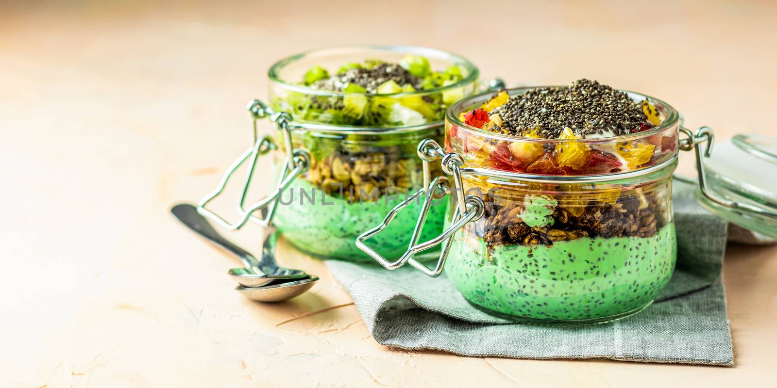 Two chia seed pudding with matcha green tea by ArtSvitlyna