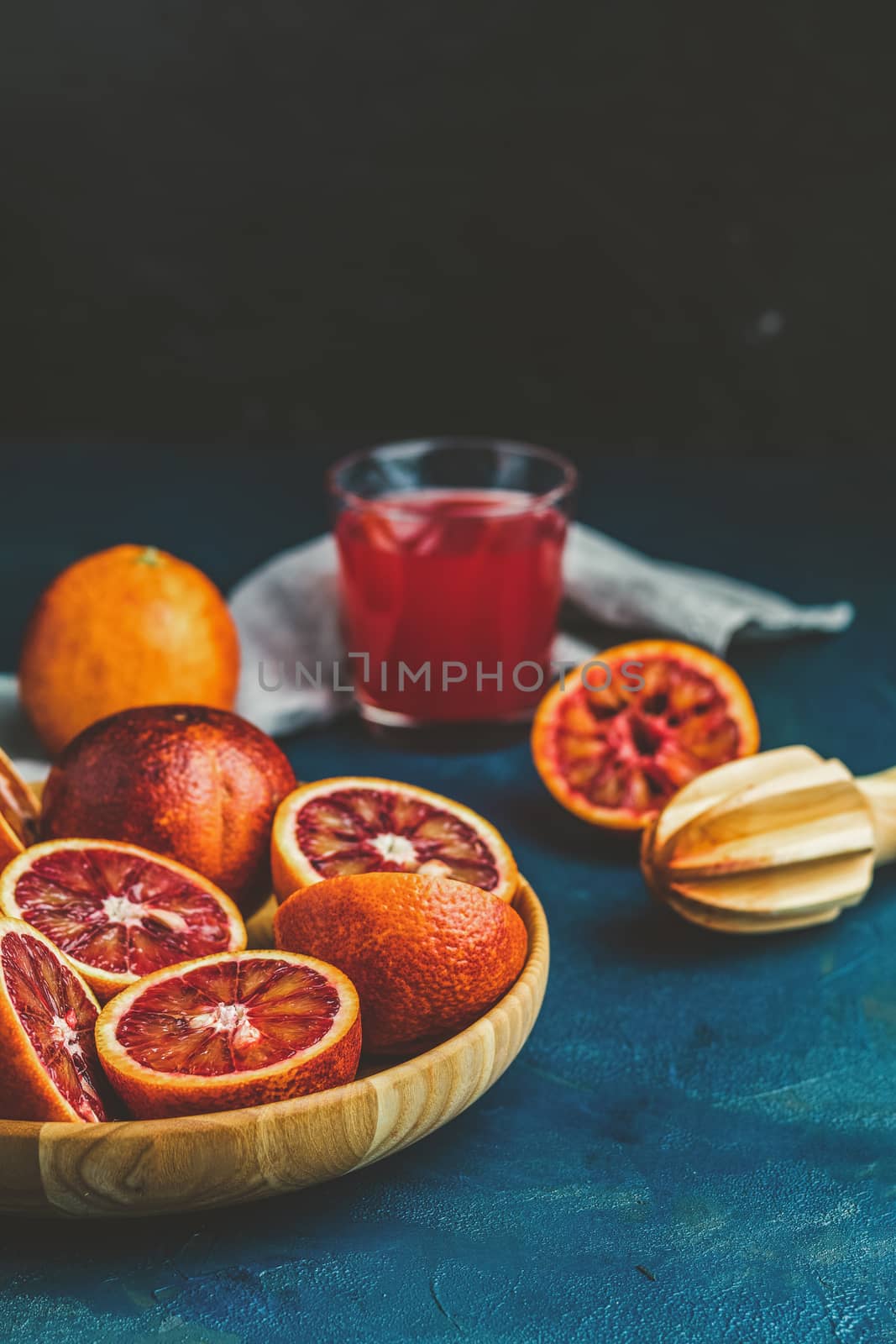 Shorts of alcohol cocktail with Sliced Sicilian Blood oranges an by ArtSvitlyna
