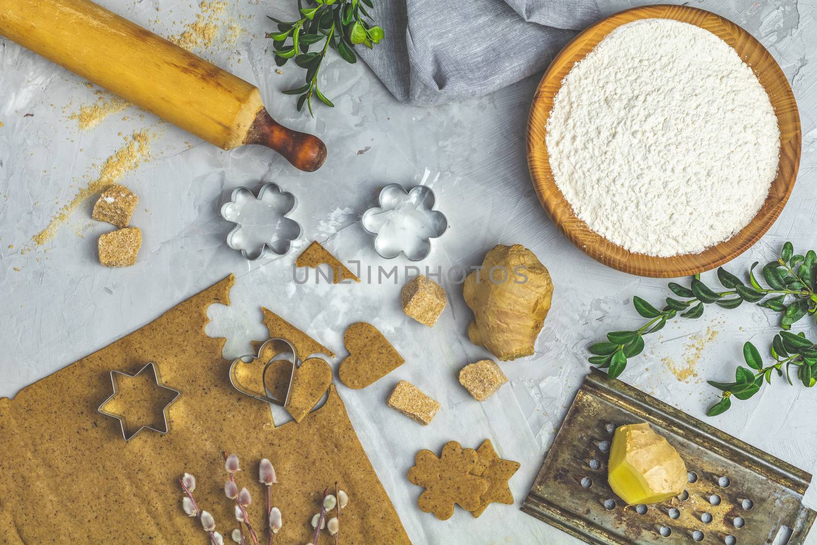 Culinary Spring or Christmas food background. Ingredients for ginger cookies. Dough for baking. View from above.