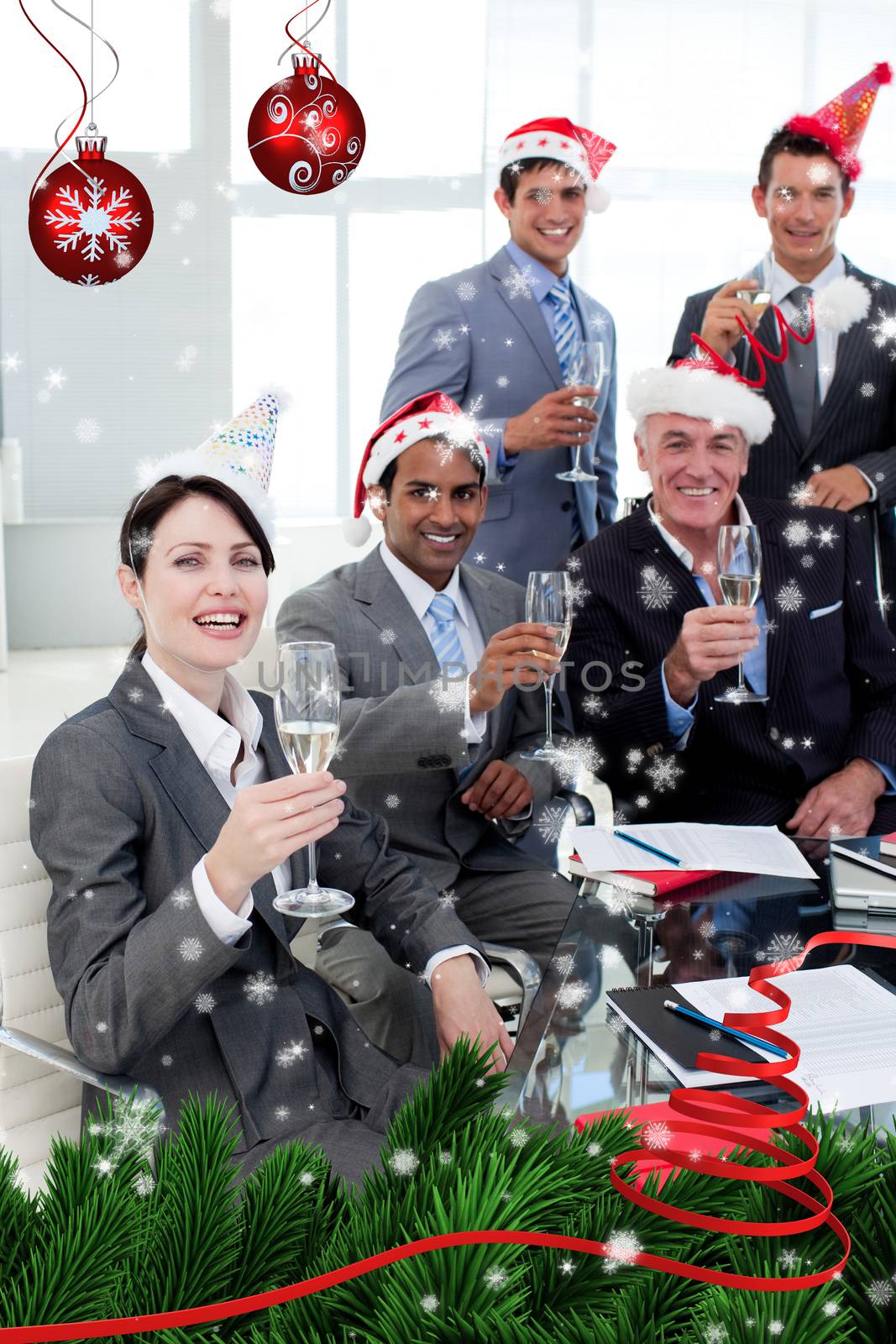 Manager and his team with novelty Christmas hat toasting at a party against snow falling