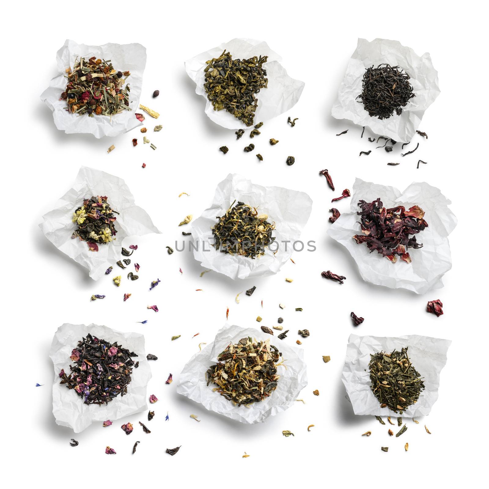 Large assortment of tea on a white background. The view from the top.