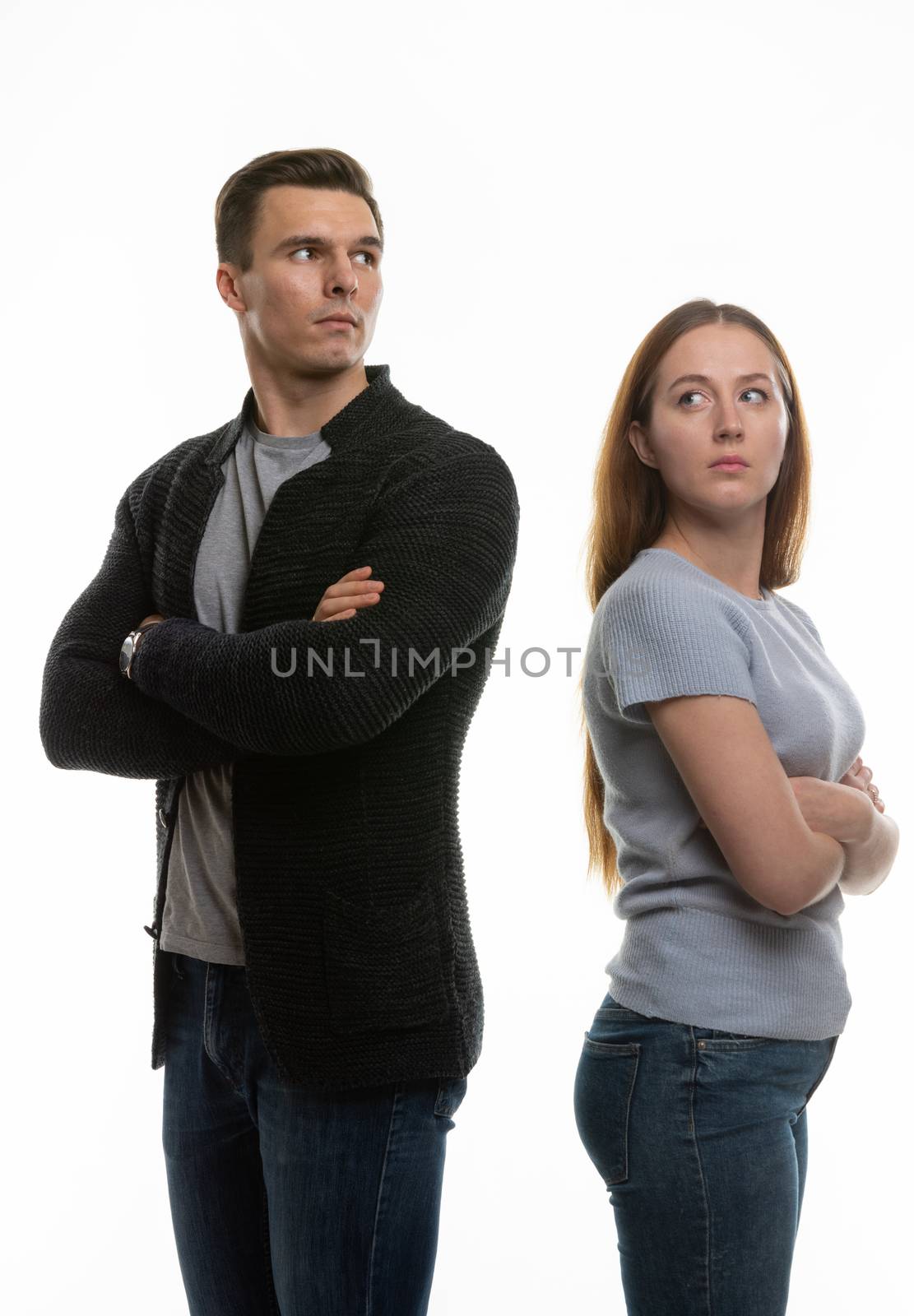 Woman and a man in a grudge look past each other