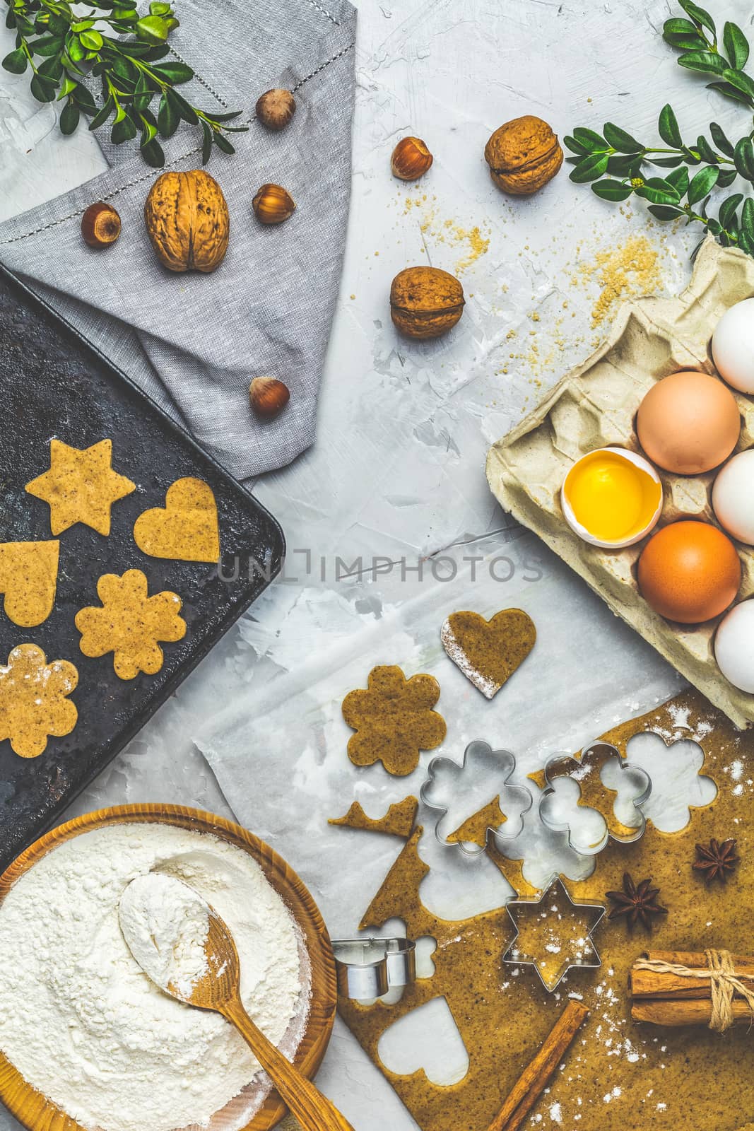Culinary Spring or Christmas food background. Ingredients for ginger cookies. Dough for baking, brown sugar, flour, eggs. View from above.