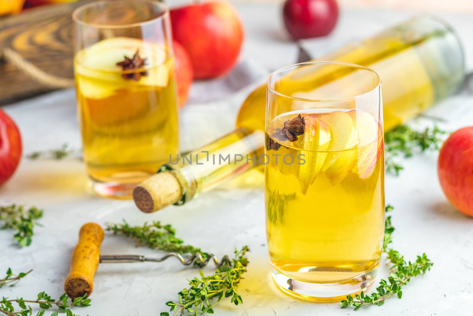 Hard apple cider cocktail with fall fresh thyme and star anise by ArtSvitlyna