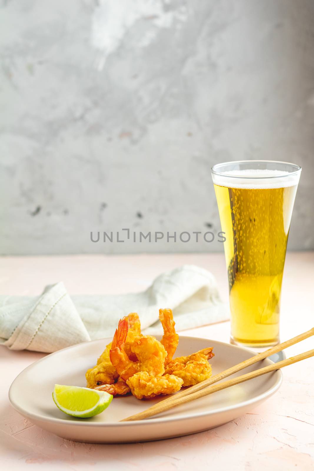 Shrimps tempura in plate and glass of beer by ArtSvitlyna