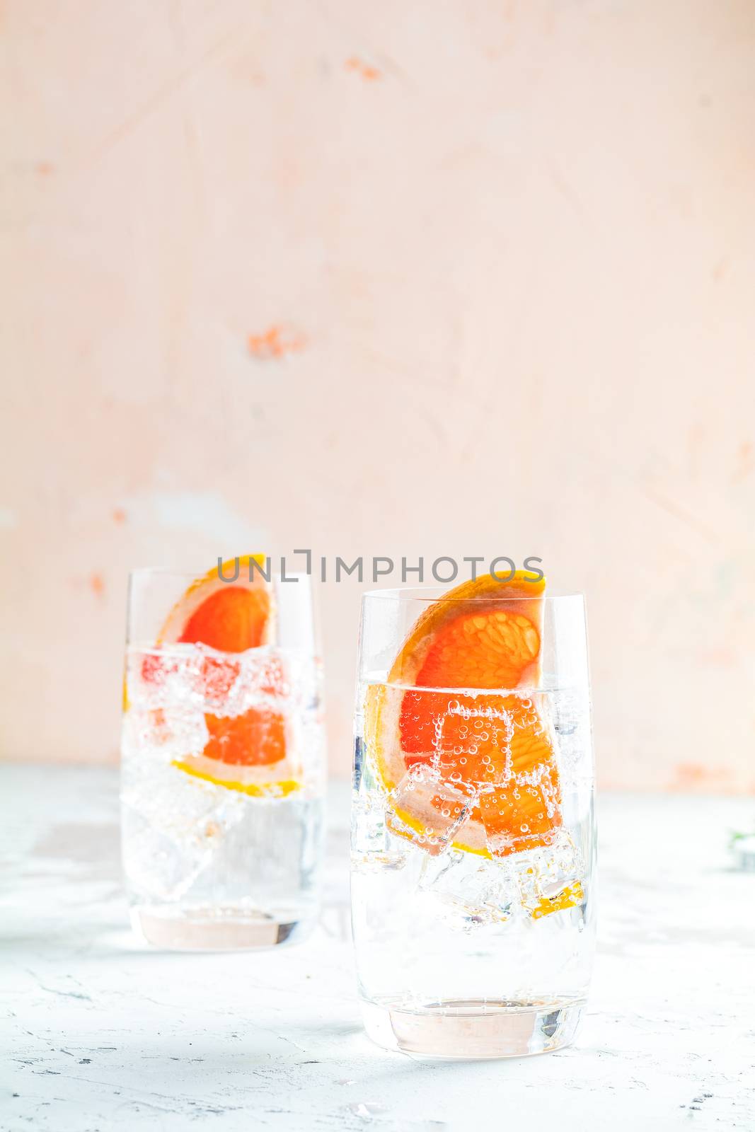 Grapefruit gin and tonic selection drink alcohol cocktail or detox water, refreshing drink with ice,