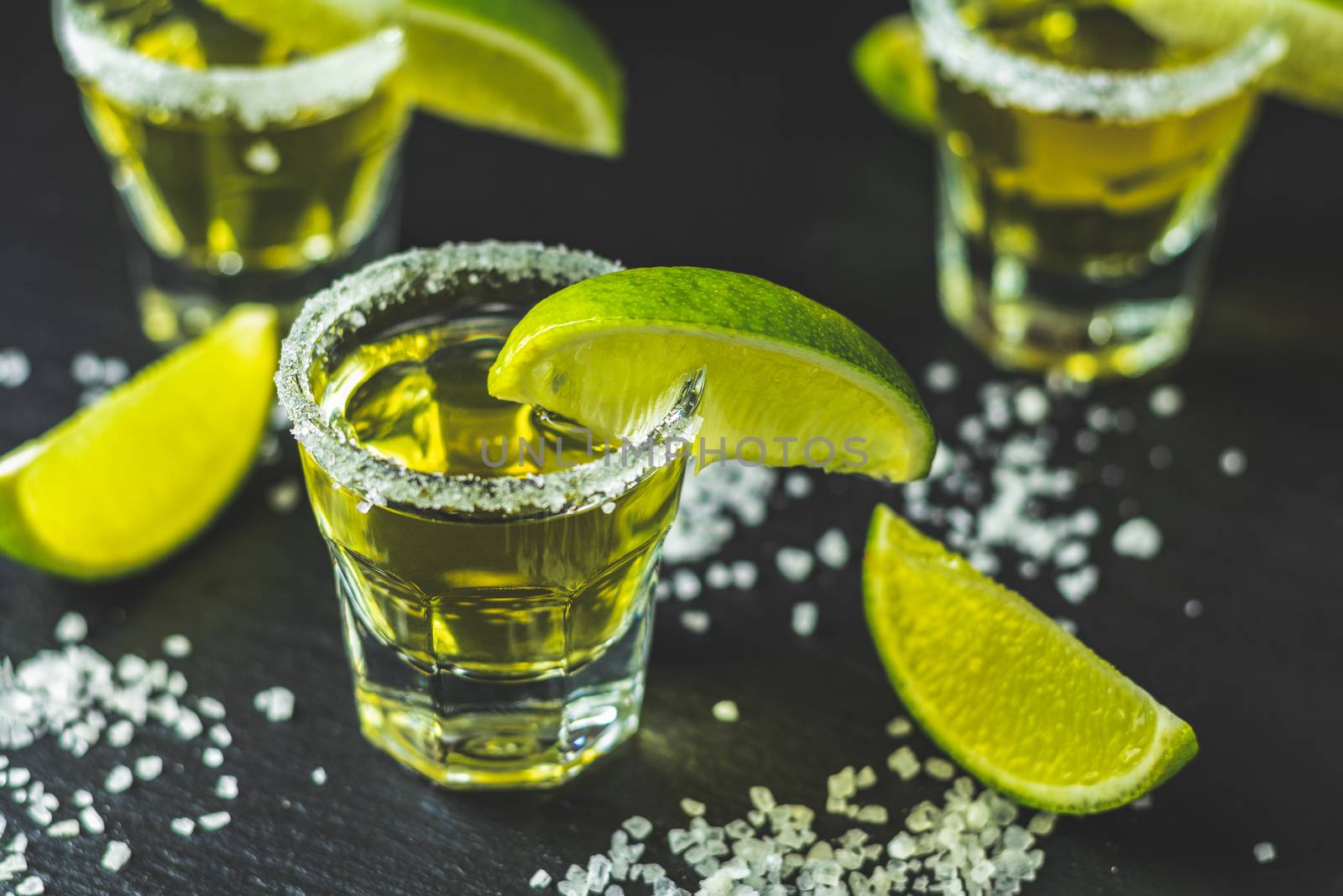 Mexican Gold Tequila shot with lime and salt by ArtSvitlyna