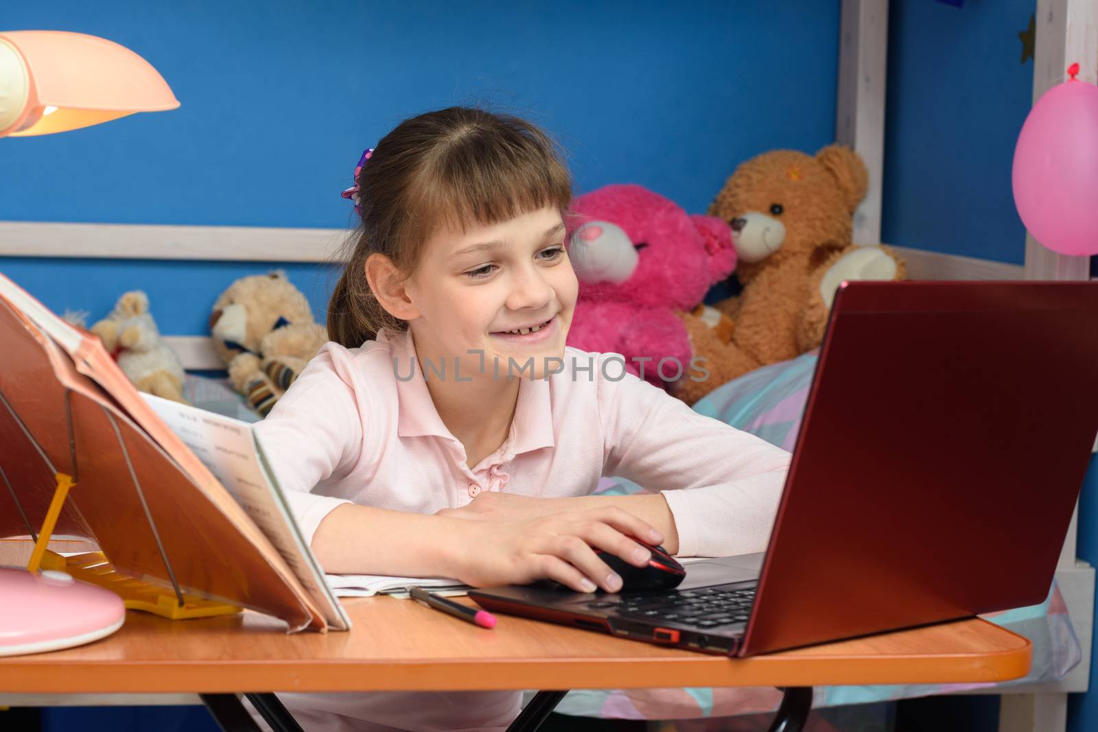 Girl joyfully studying at school without leaving home