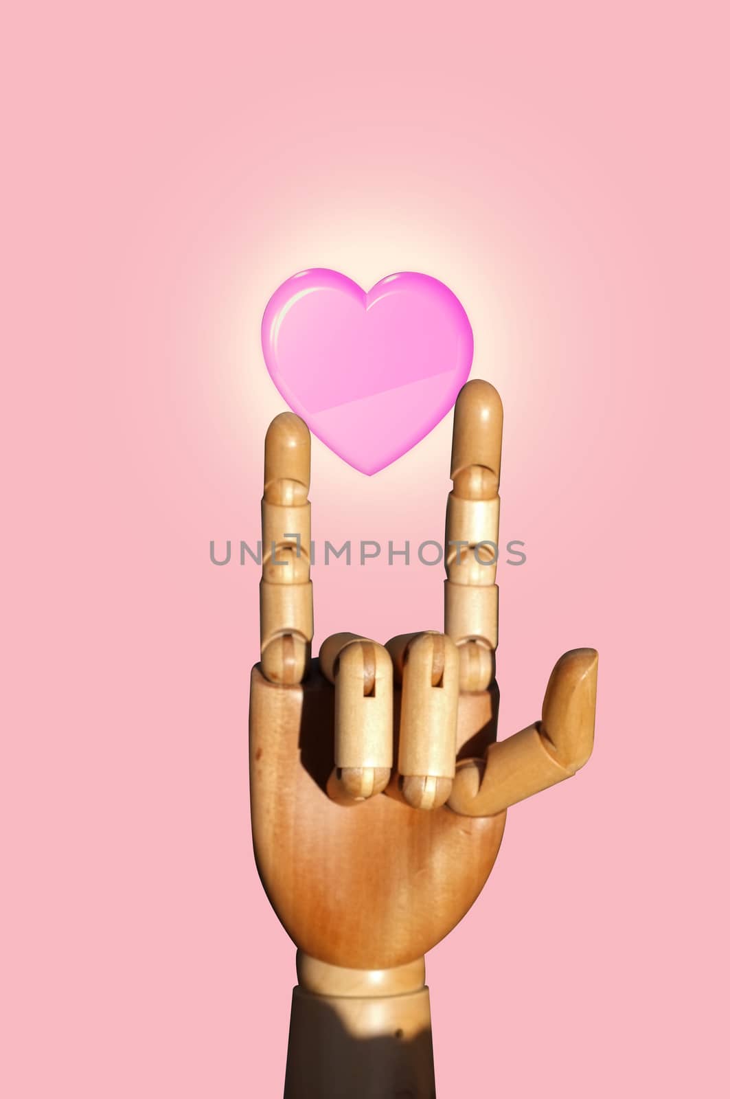 A hand of wood doll make love sign on pink background ,  Concept VALENTINE day  