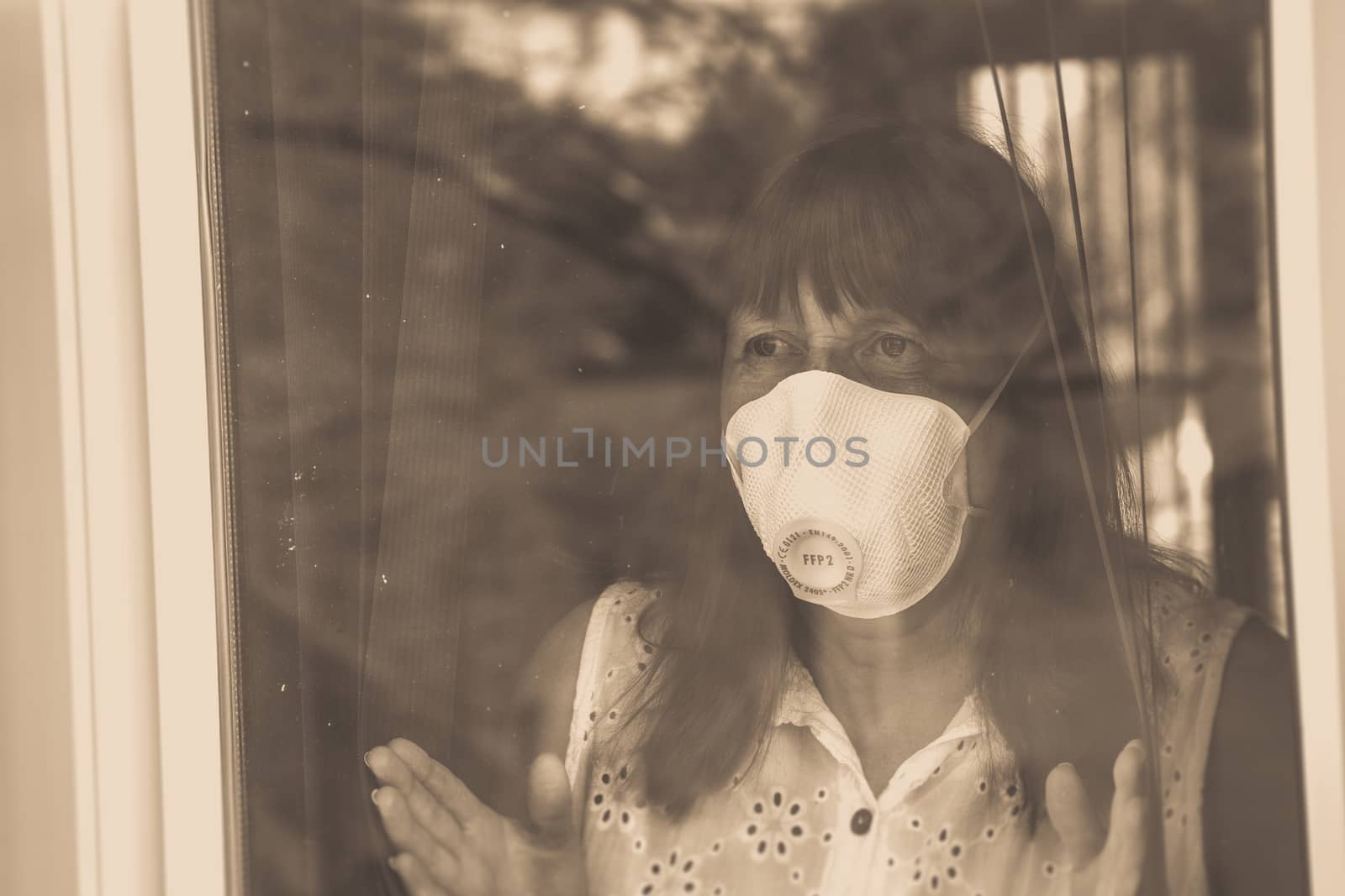 Woman with medical face mask Quarantine during Coronavirus pandemic. by paddythegolfer