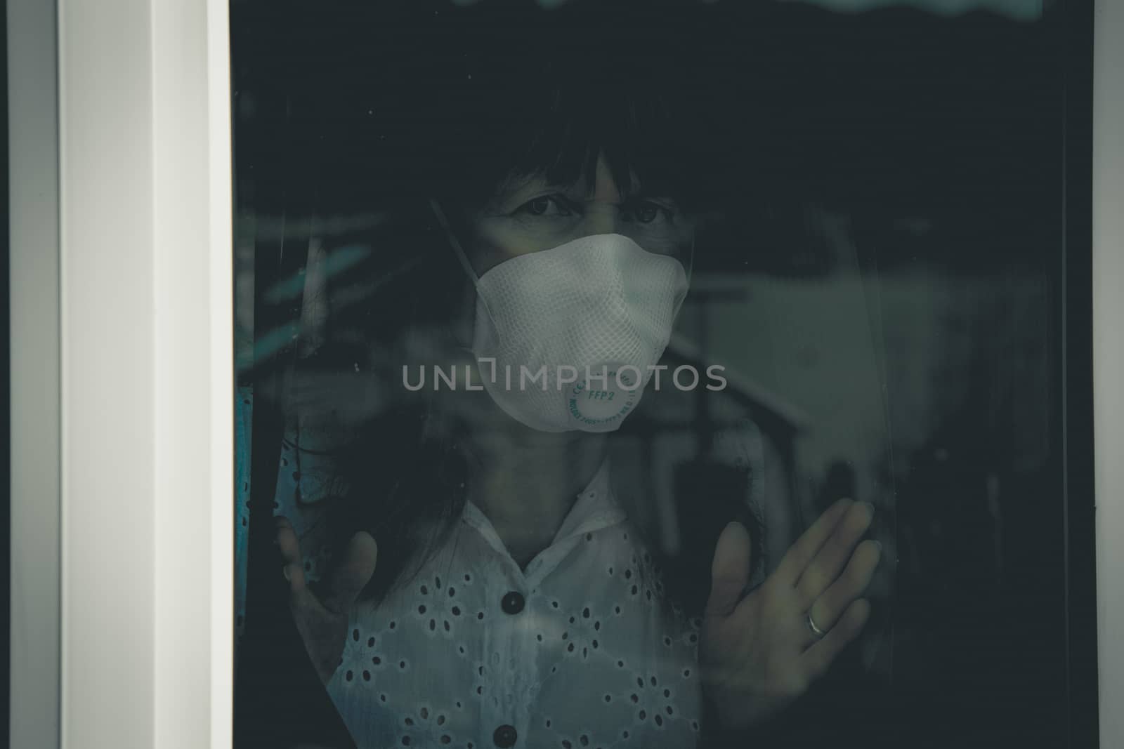 Woman with medical face mask Quarantine during Coronavirus pandemic. by paddythegolfer