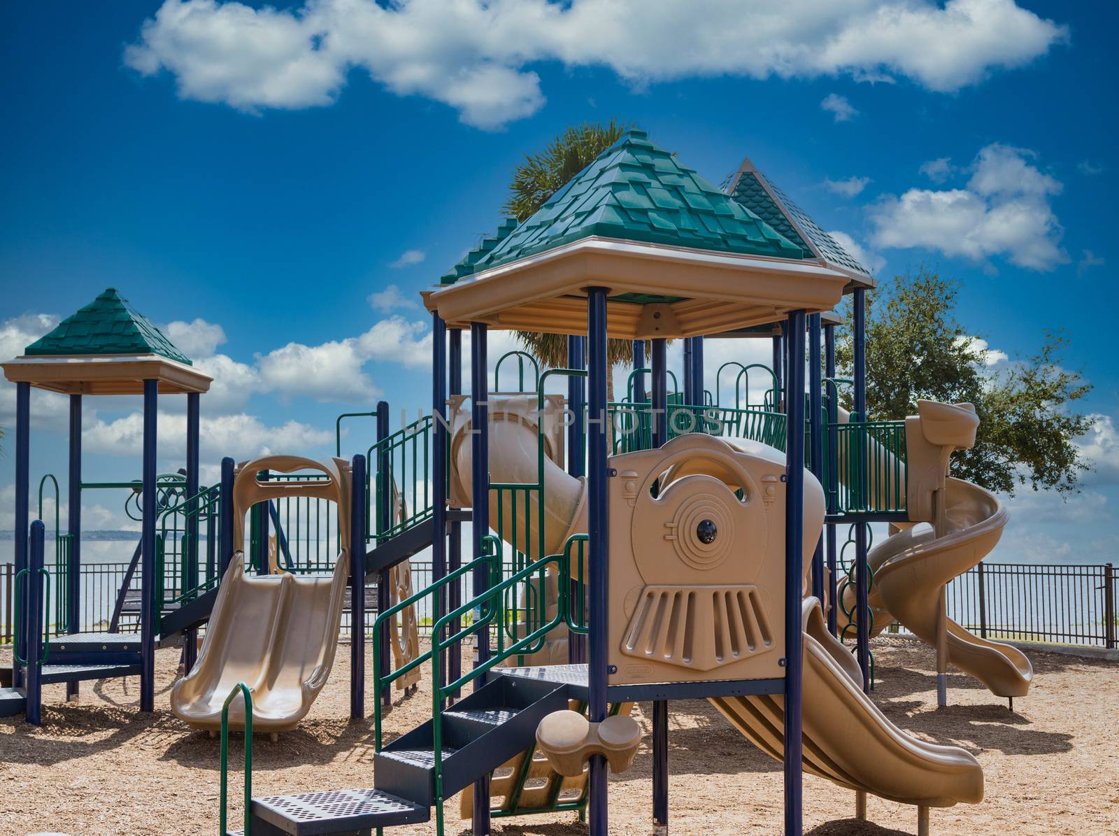 Colorful plastic playground equipment in a park