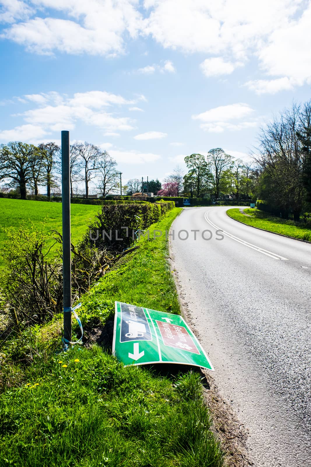 Knocked over and abandoned road sign UK