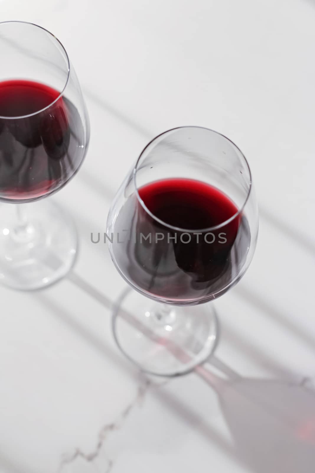 Two glasses of red wine, organic beverage product by Anneleven