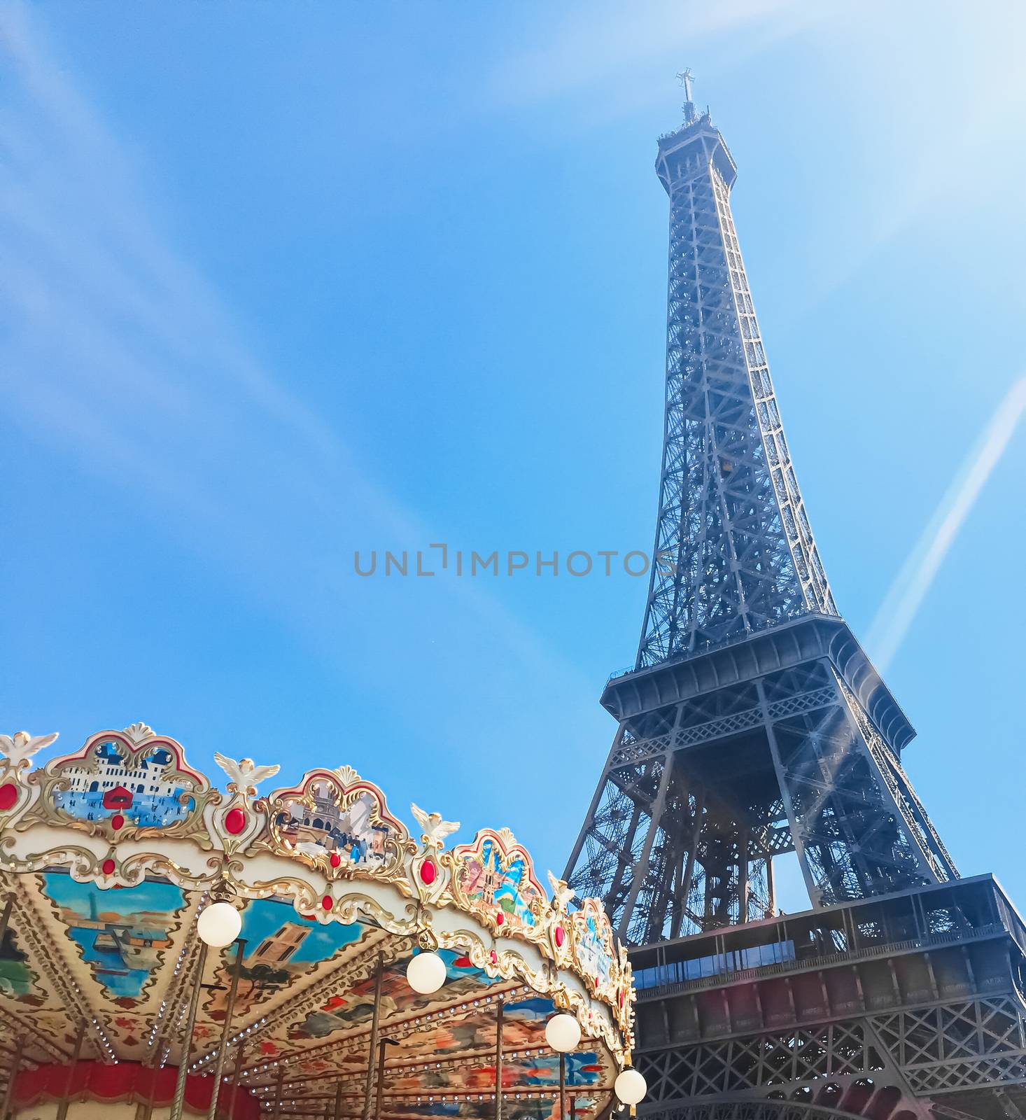 Eiffel Tower and blue sky, famous landmark in Paris, France by Anneleven