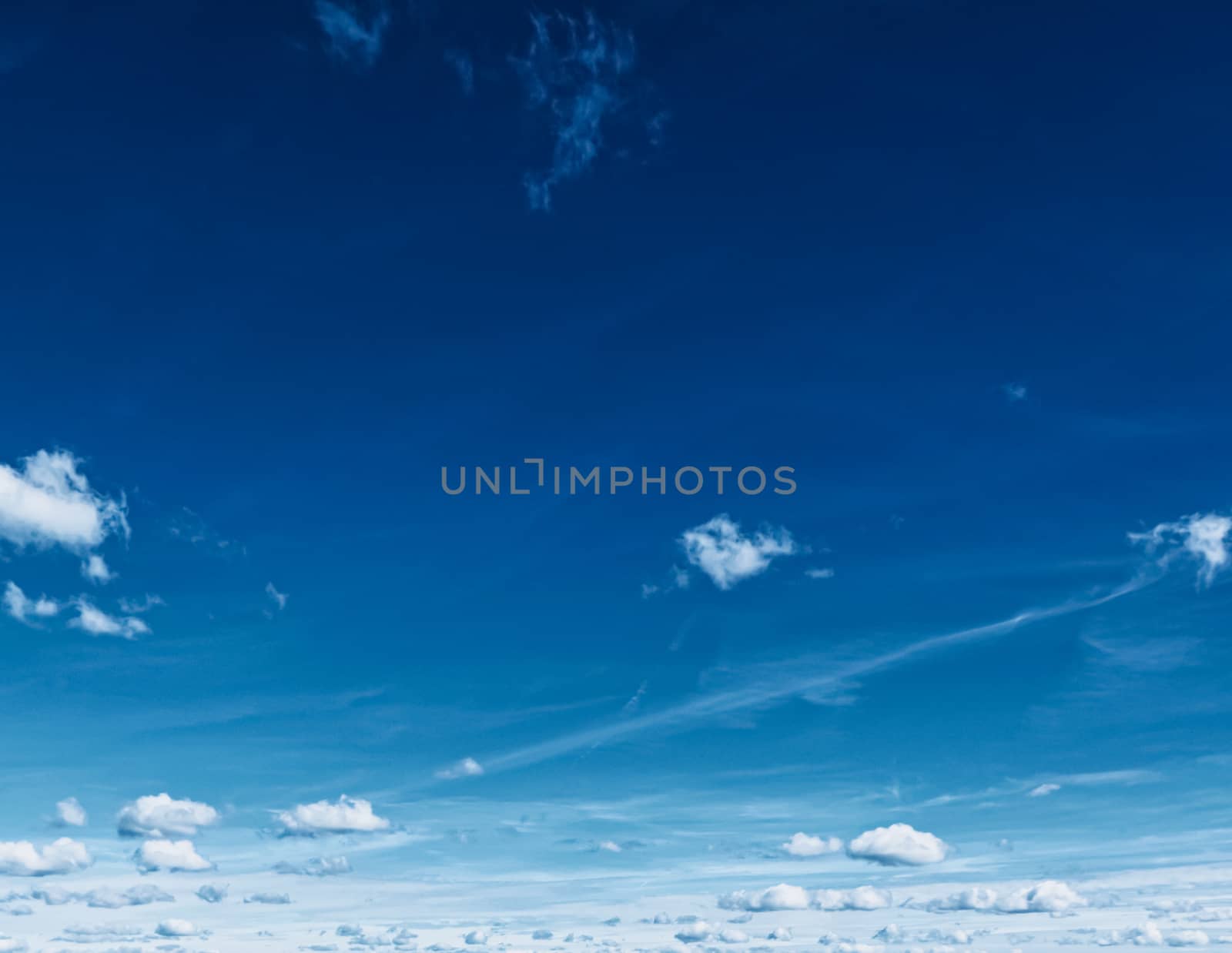 Bright blue sky with clouds, nature and environment by Anneleven