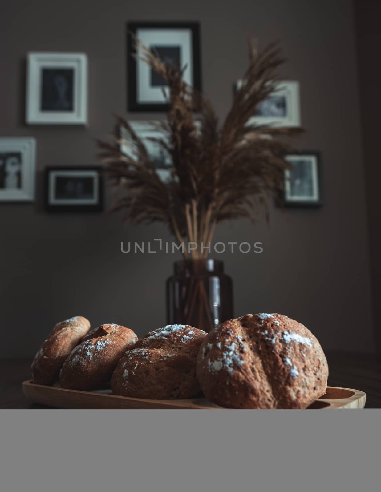 Fresh homemade breads with some decorations on the table.