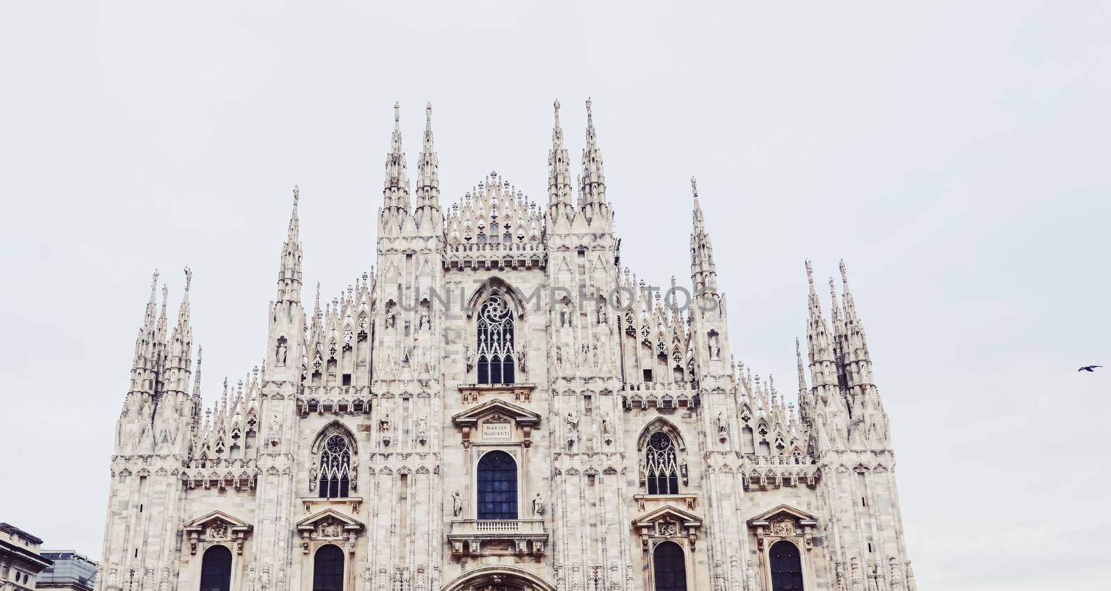 Milan Cathedral known as Duomo di Milano, historical building and famous landmark in Lombardy region in Northern Italy in the daytime