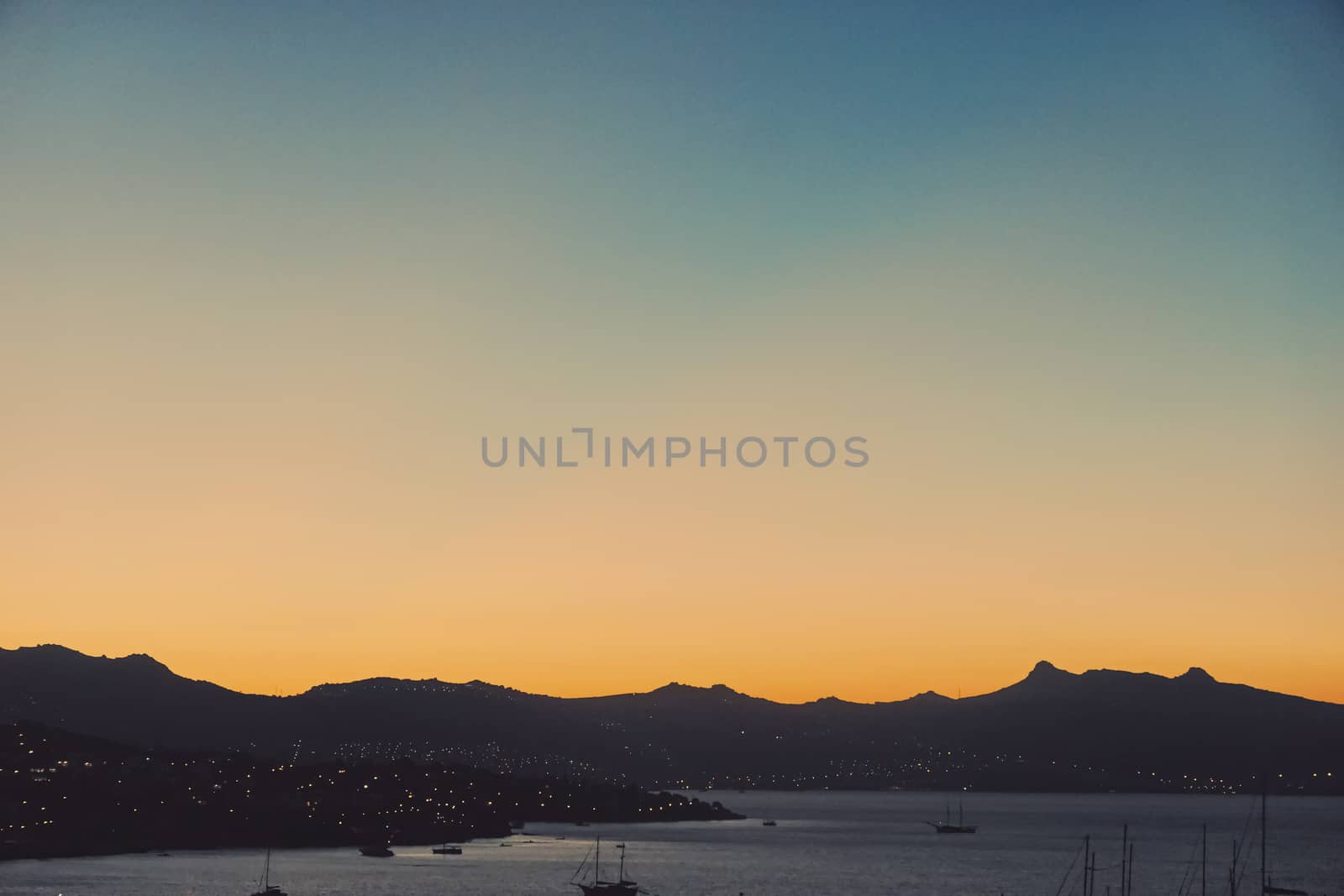 Beautiful sea view and mountains in the Mediterranean at sunset, summer vacation travel and holiday destination