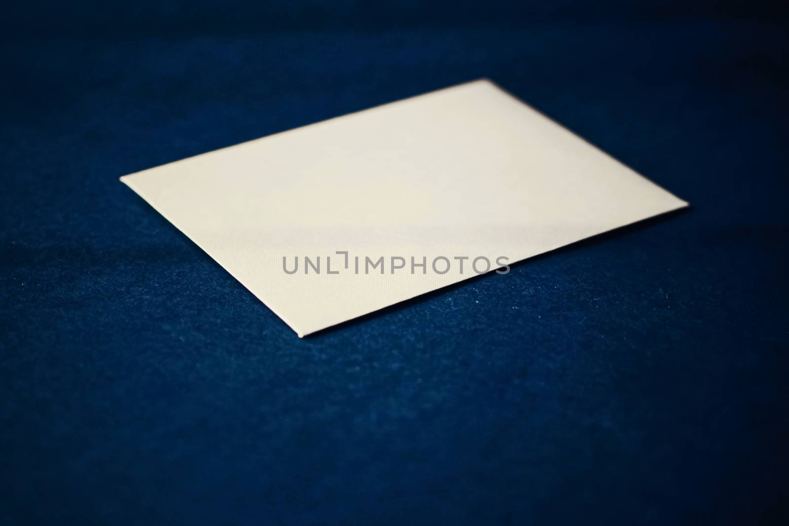 Blank beige paper card on blue background, business and luxury brand identity mockup by Anneleven