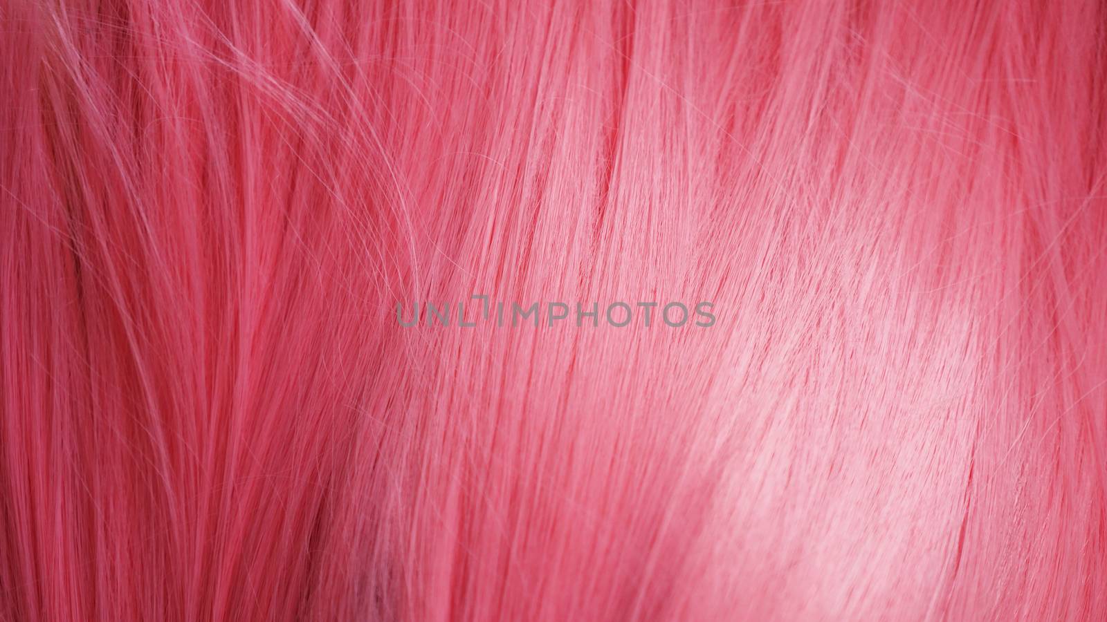 Pink Hair wig Closeup texture. May be used as background