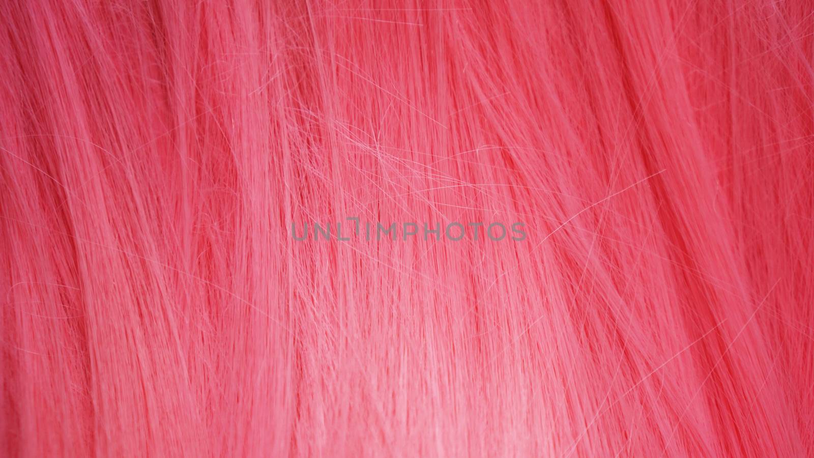 Pink Hair wig Closeup texture. May be used as background