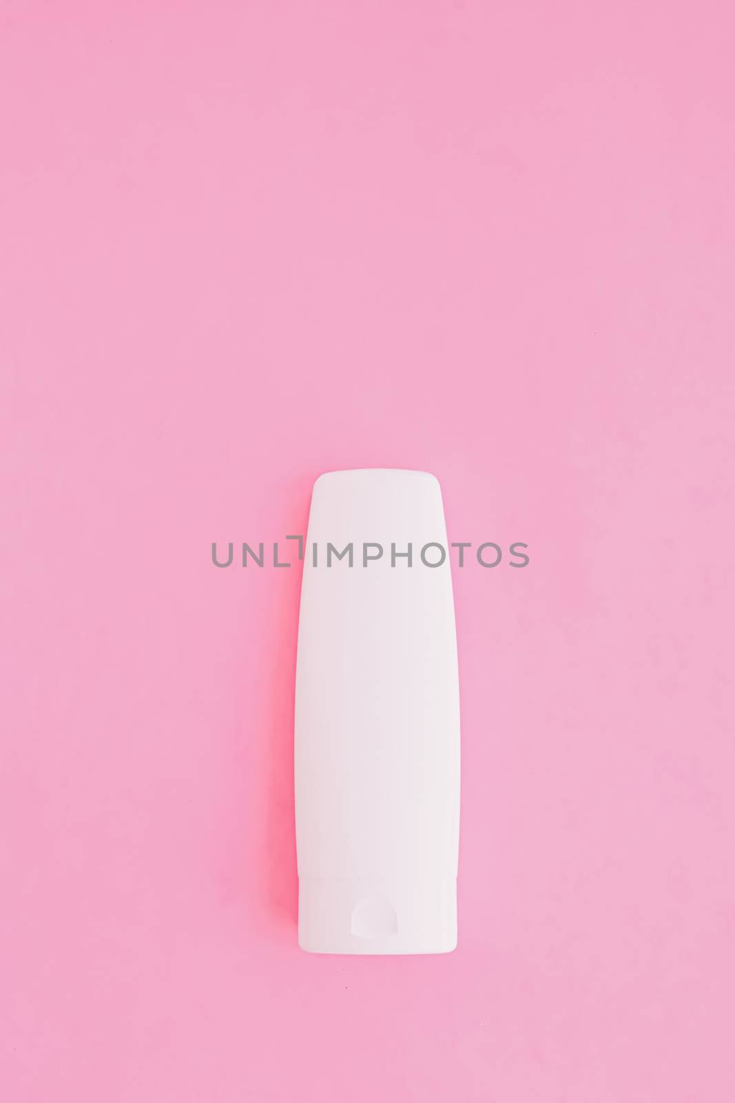 Moisturizing hand cream or body lotion on pink background, beauty product and skin care cosmetics, flatlay