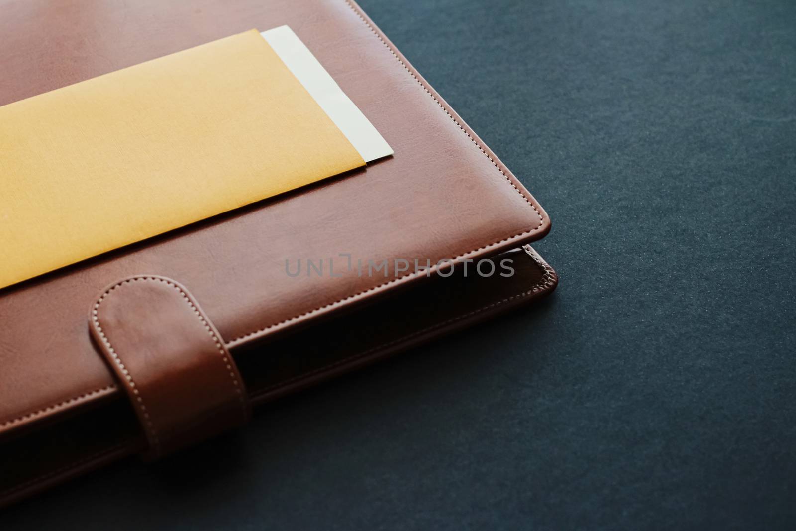 Office desk with briefcase and business card, finance and economy concept