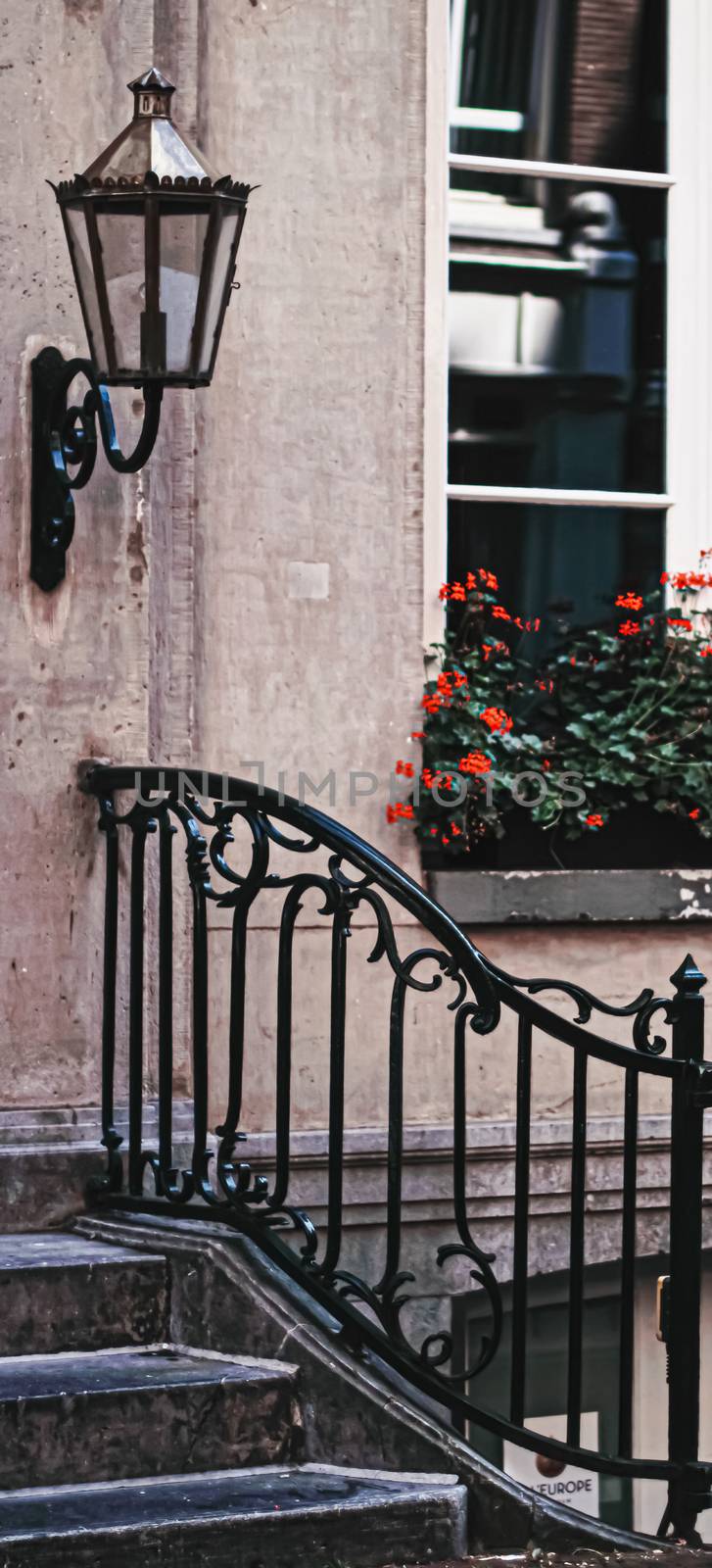 Architectural detail of a building on the main city center street of Amsterdam in Netherlands, european architecture