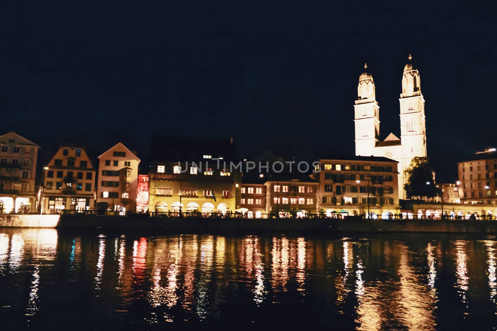 European architecture and night view of city center street in Zurich, Switzerland by Anneleven